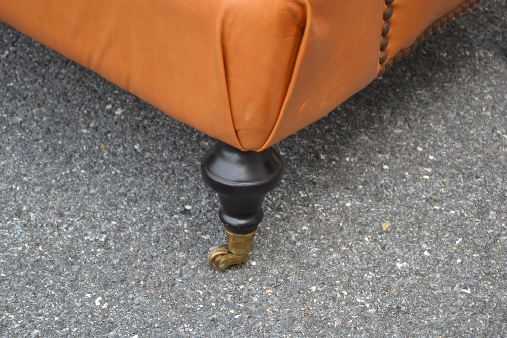 Dark Saffron Leather Armchair and Ottoman