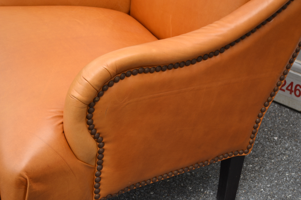 Dark Saffron Leather Armchair and Ottoman