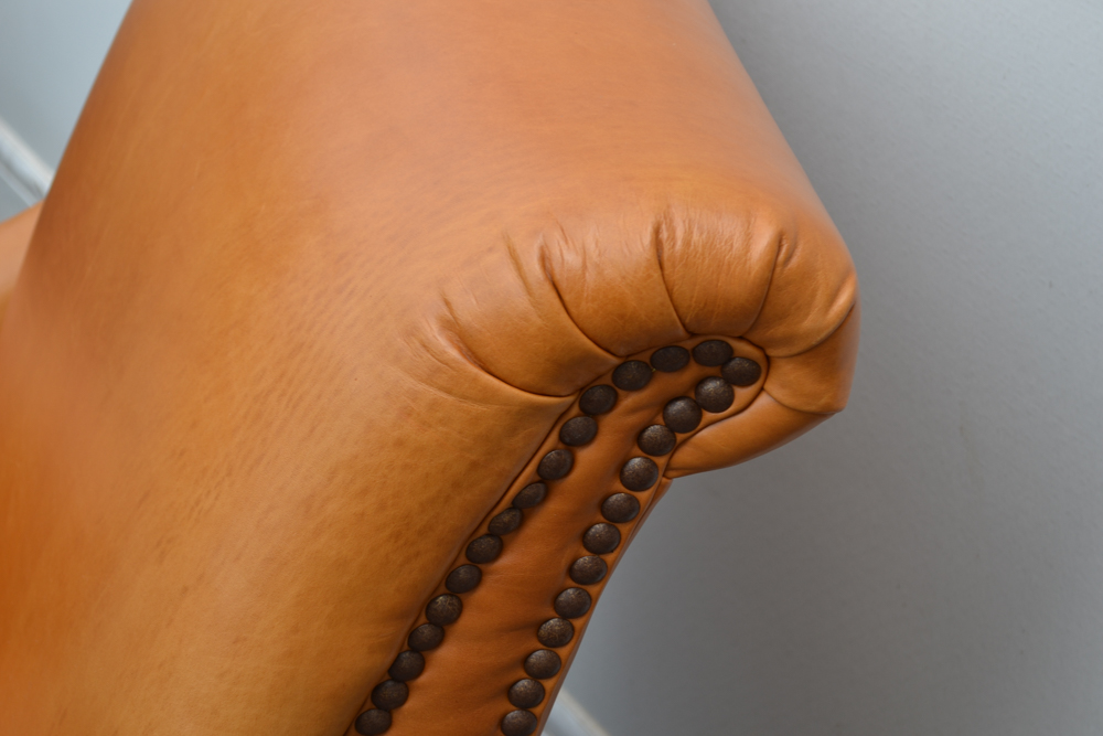 Dark Saffron Leather Armchair and Ottoman