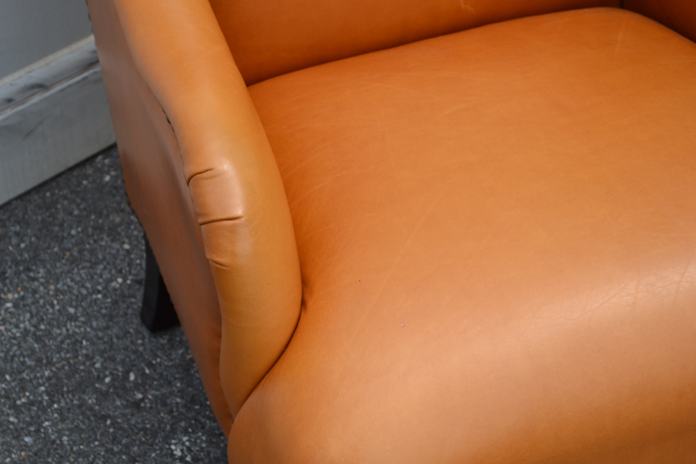 Dark Saffron Leather Armchair and Ottoman