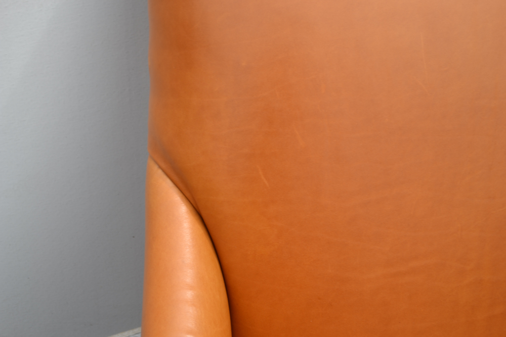 Dark Saffron Leather Armchair and Ottoman