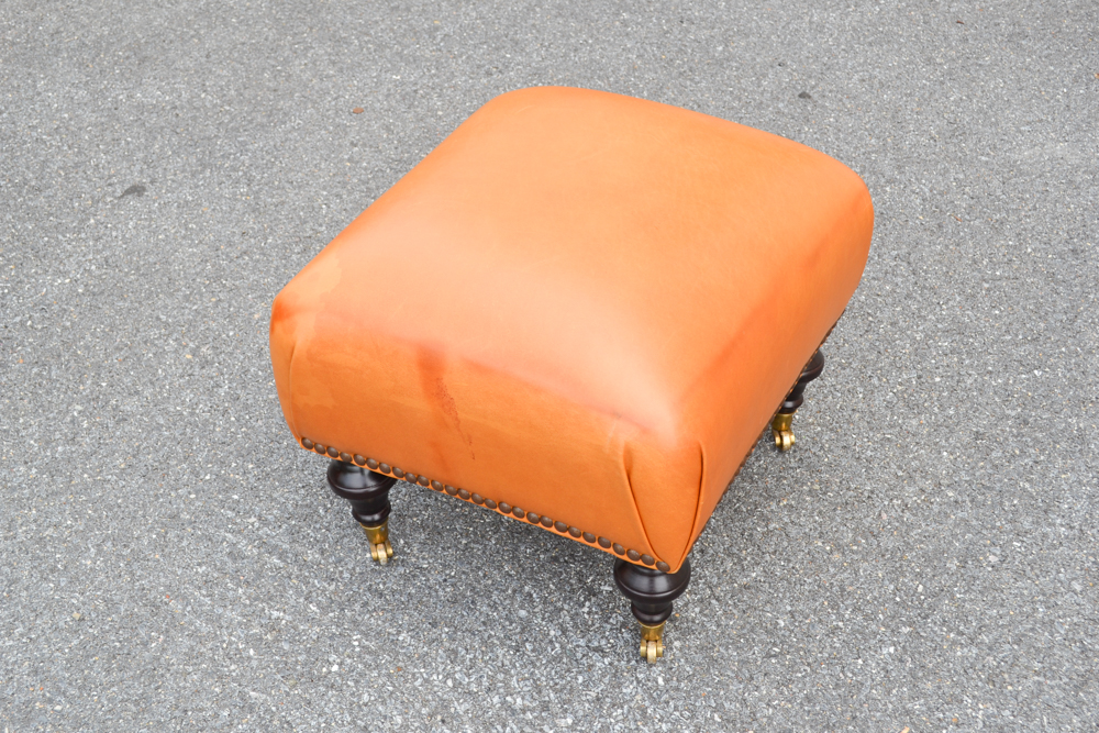 Dark Saffron Leather Armchair and Ottoman