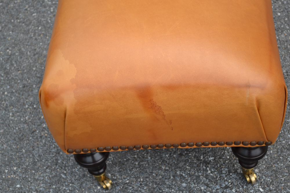 Dark Saffron Leather Armchair and Ottoman