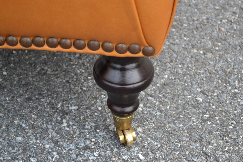 Dark Saffron Leather Armchair and Ottoman