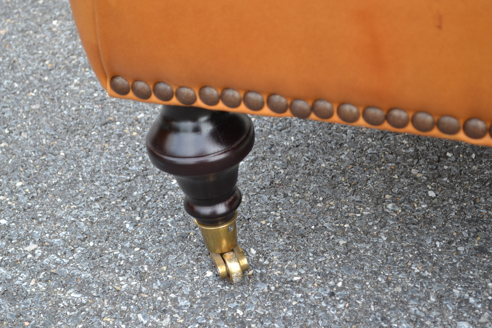 Dark Saffron Leather Armchair and Ottoman