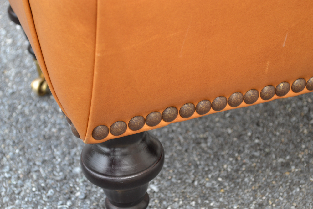 Dark Saffron Leather Armchair and Ottoman
