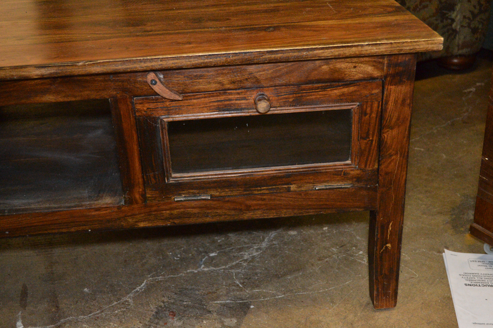 Dark Stained Wood Coffee Table With Glass Doors