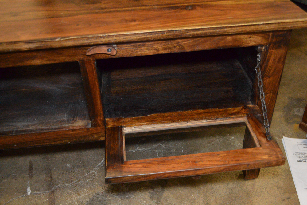 Dark Stained Wood Coffee Table With Glass Doors