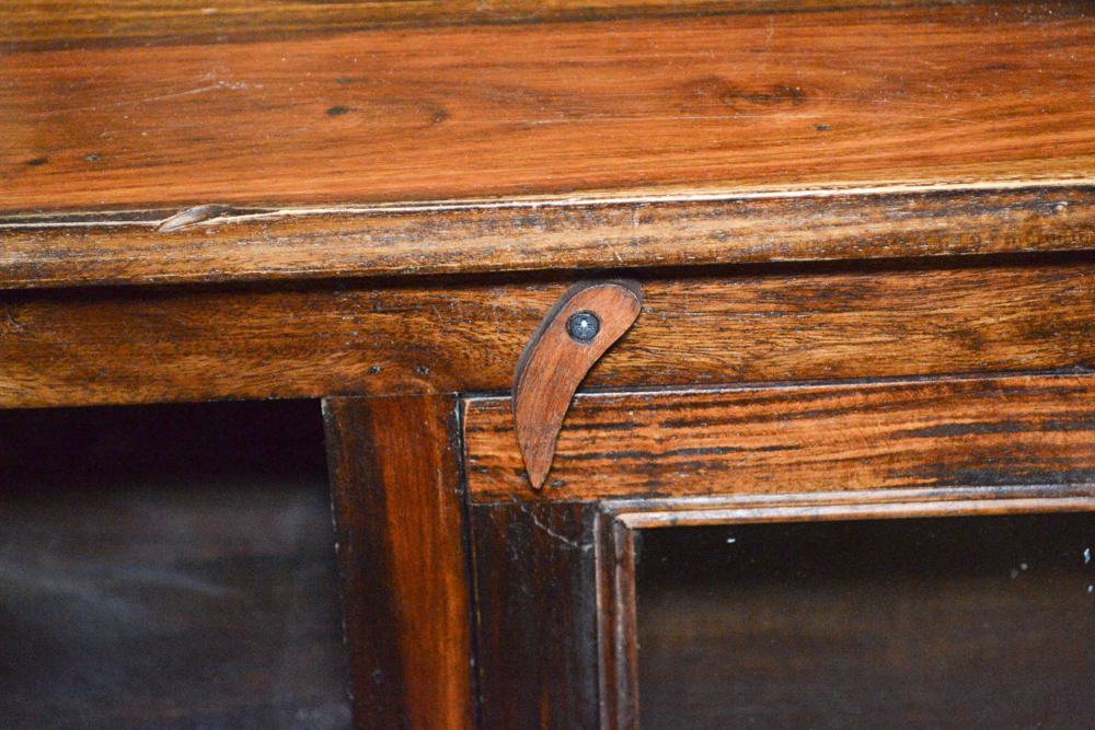 Dark Stained Wood Coffee Table With Glass Doors