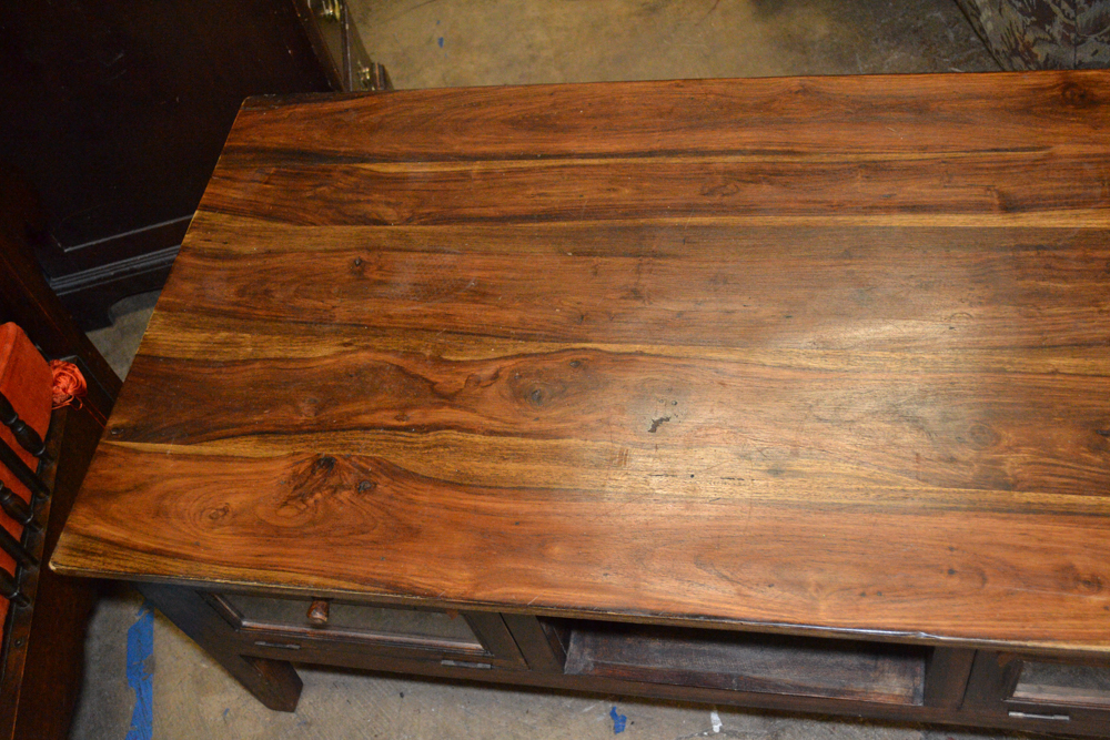 Dark Stained Wood Coffee Table With Glass Doors