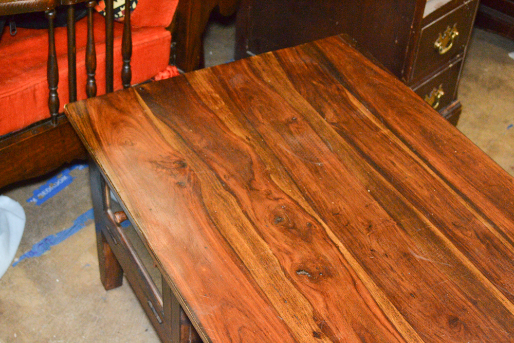 Dark Stained Wood Coffee Table With Glass Doors