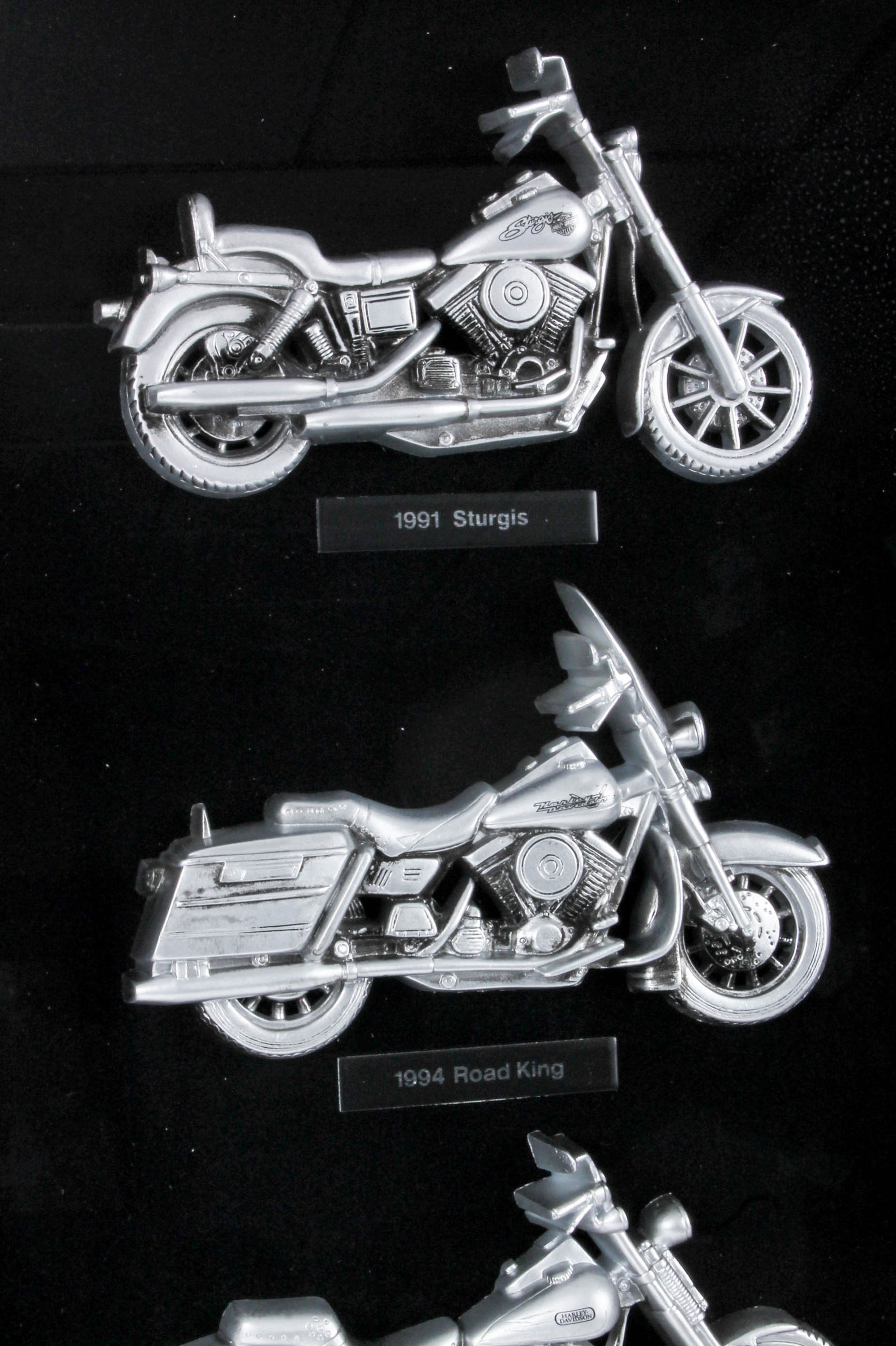Harley-Davidson Figurine Collection and a Phone Charging Station
