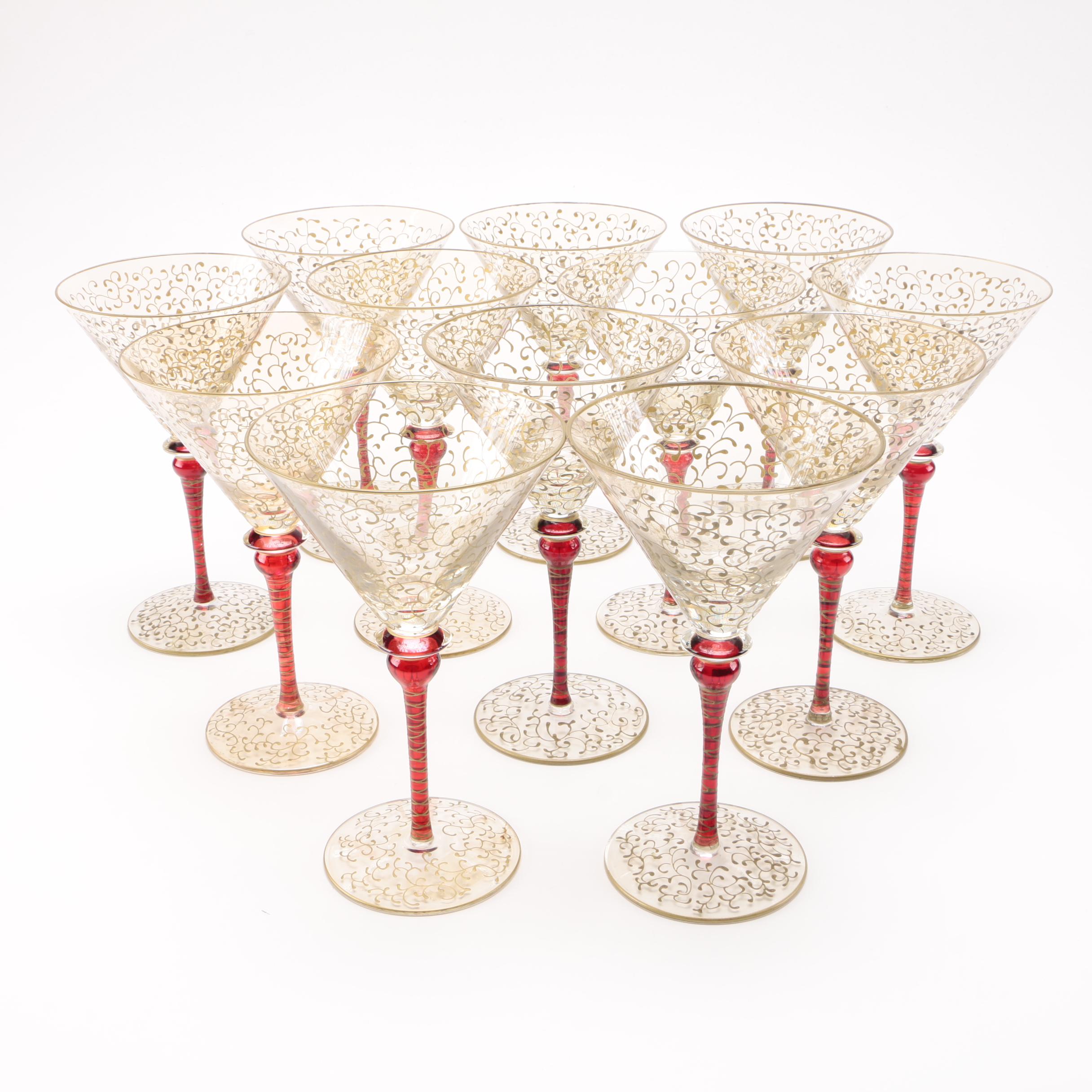 Martini Glasses With Gold Tones and Red Stems