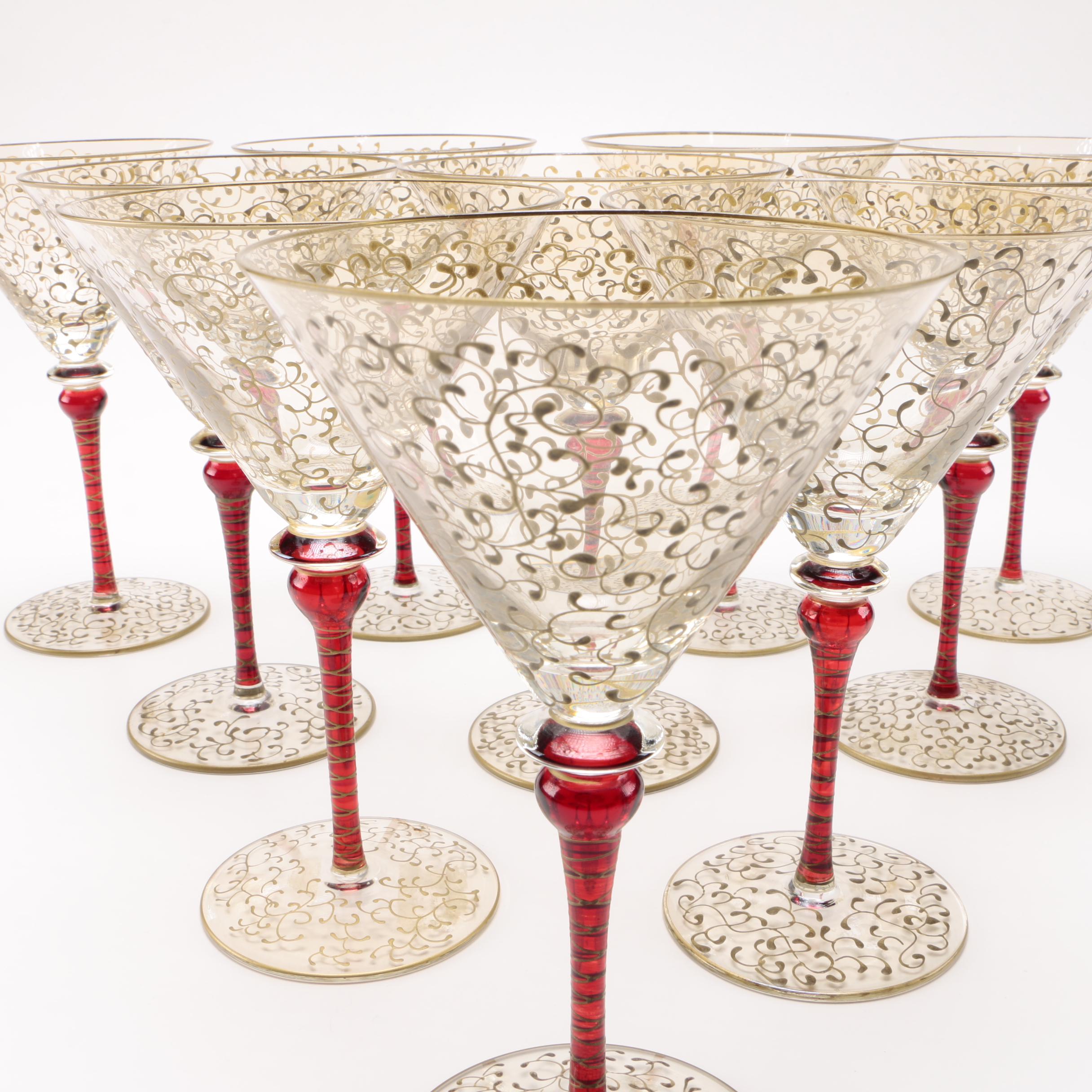 Martini Glasses With Gold Tones and Red Stems