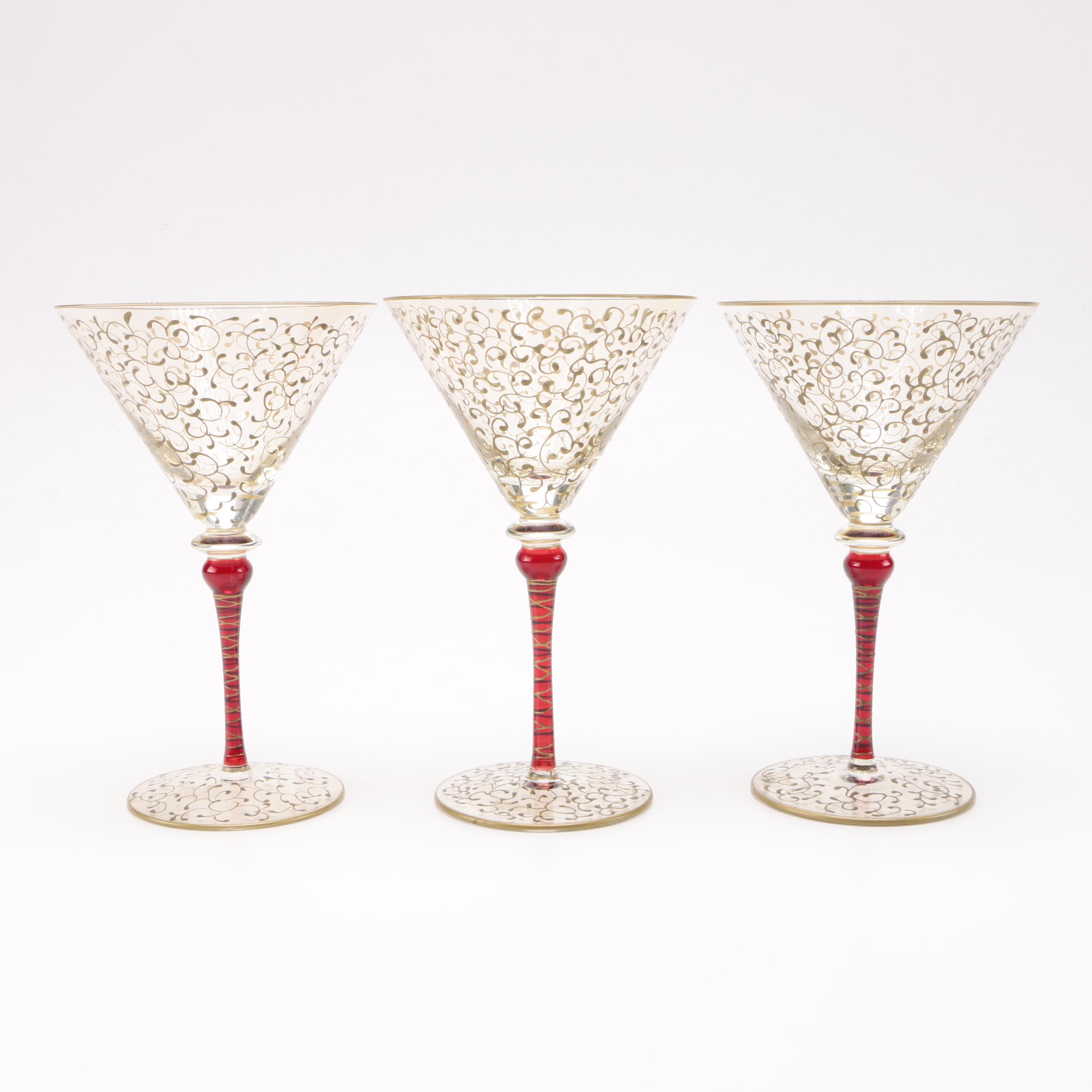 Martini Glasses With Gold Tones and Red Stems