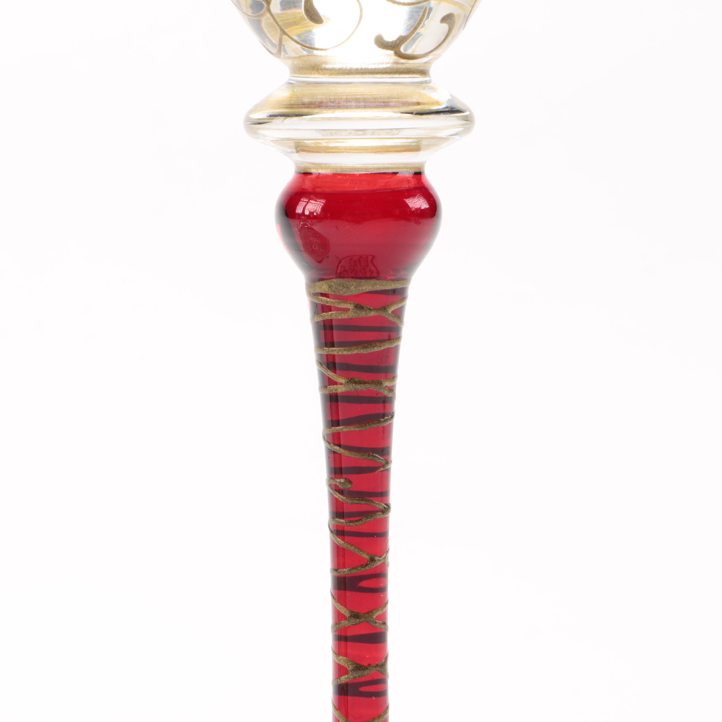 Martini Glasses With Gold Tones and Red Stems