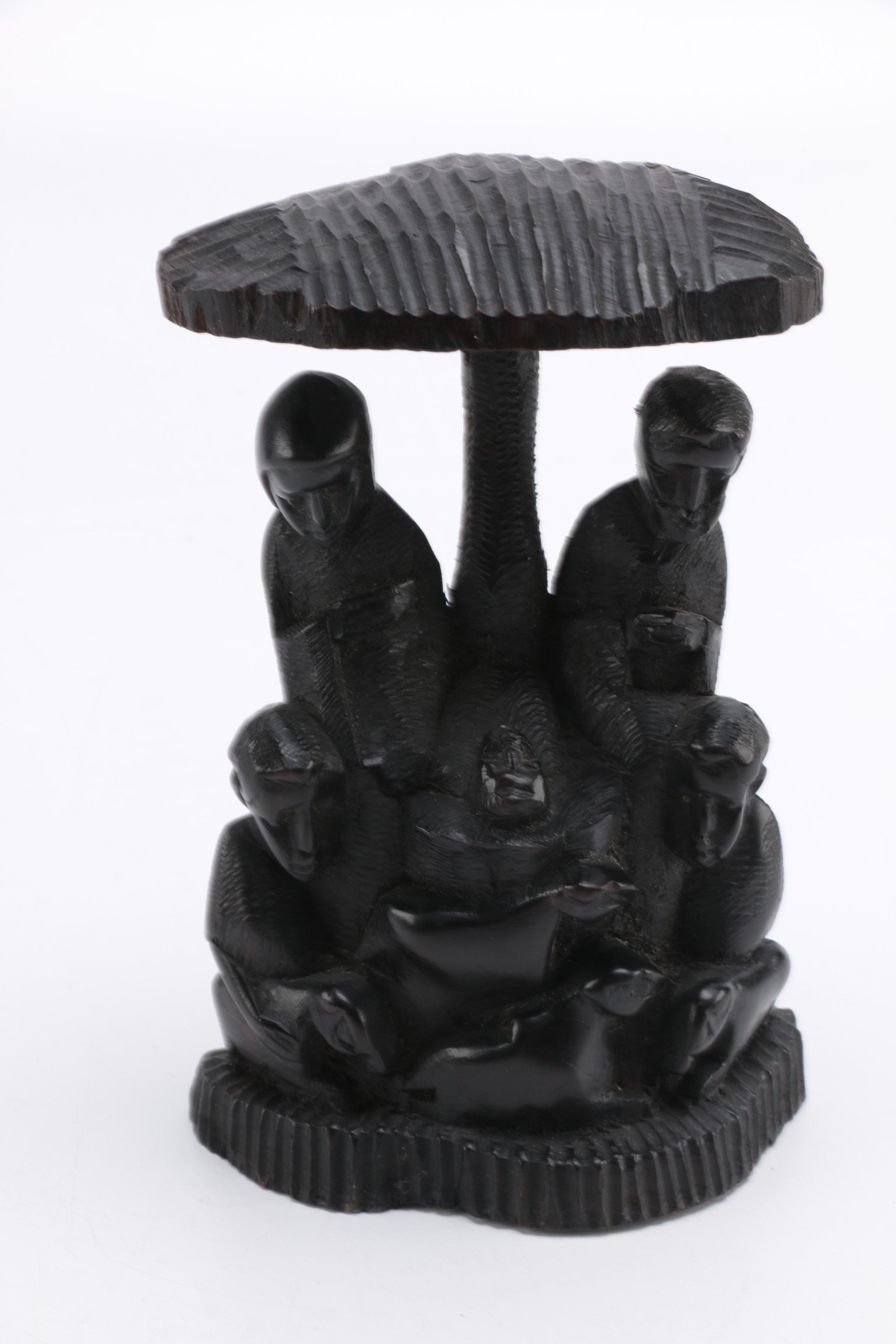 Hand-Carved Figural Sculpture