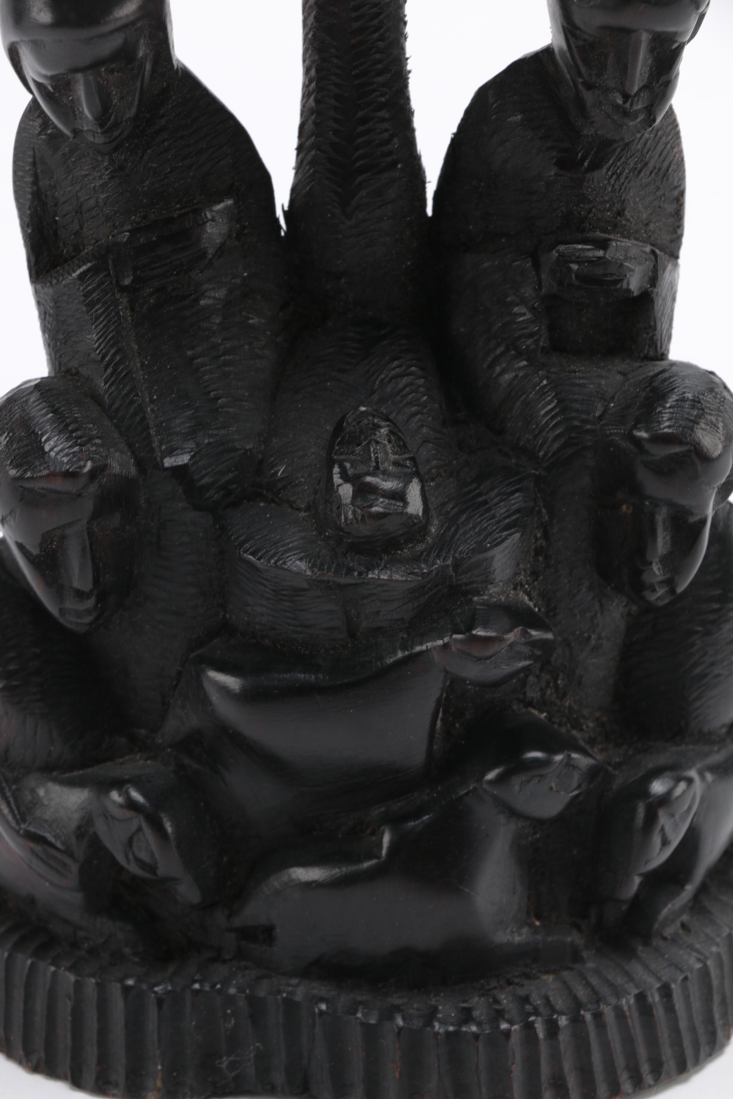 Hand-Carved Figural Sculpture