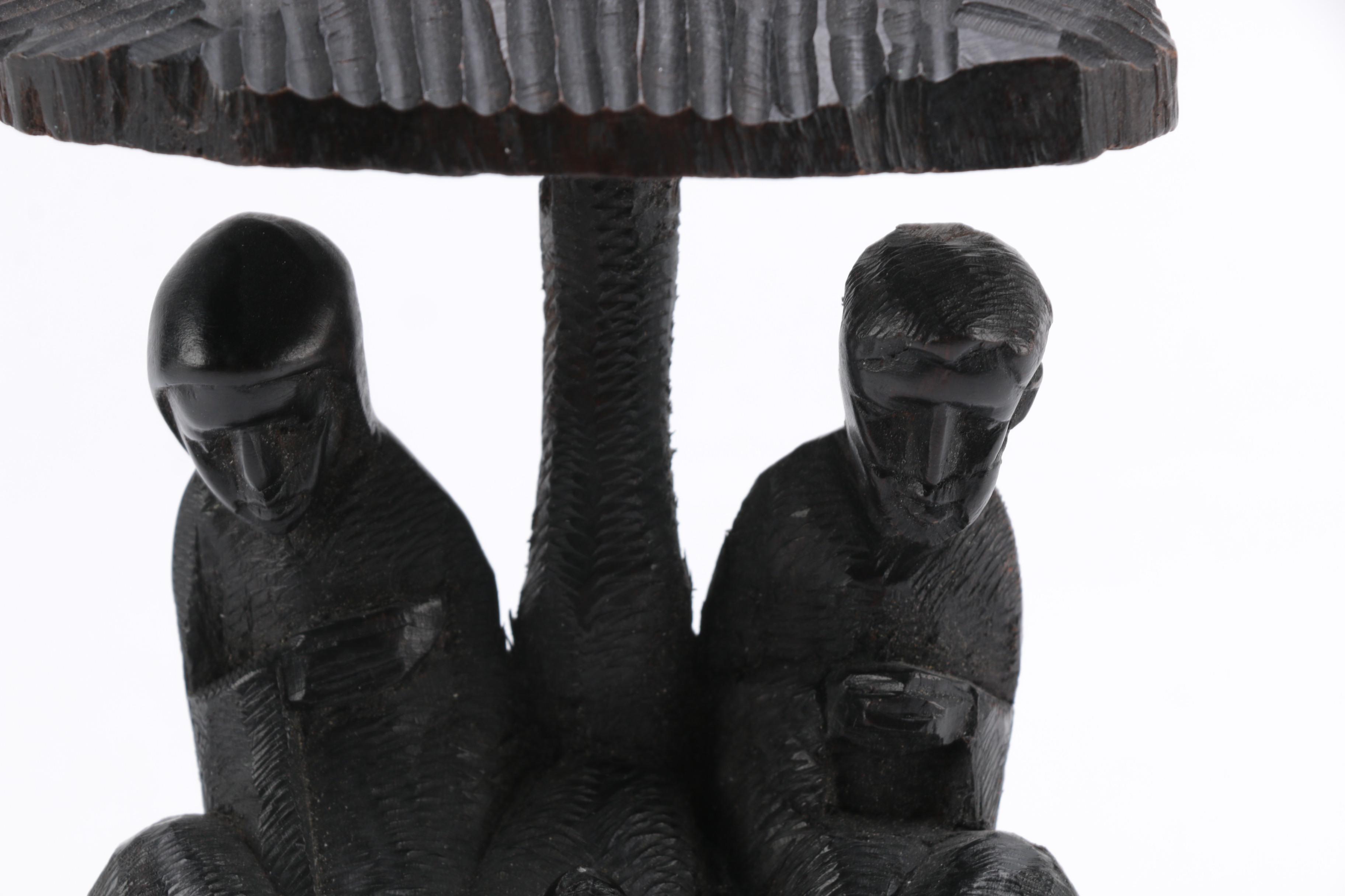 Hand-Carved Figural Sculpture