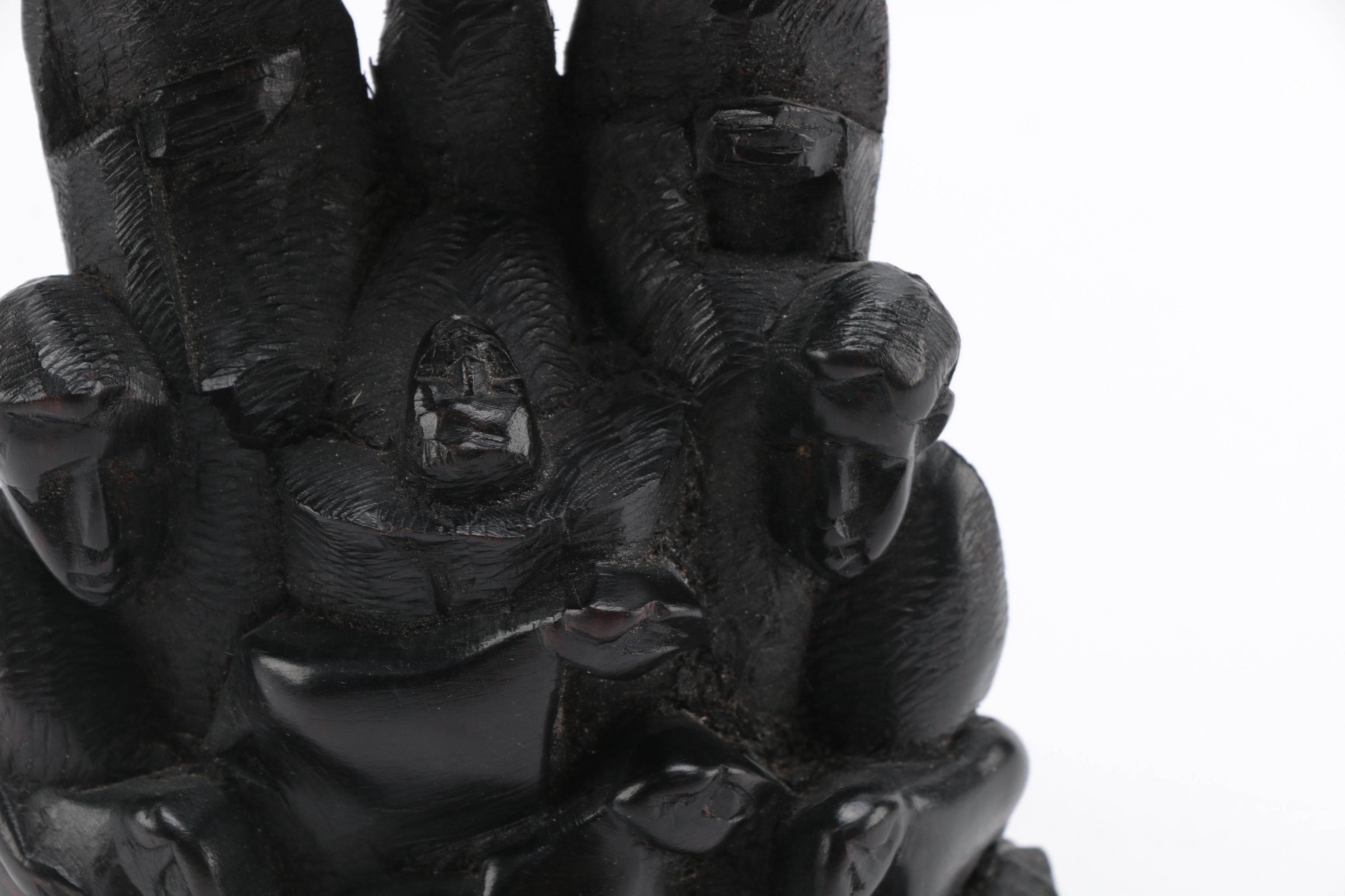 Hand-Carved Figural Sculpture