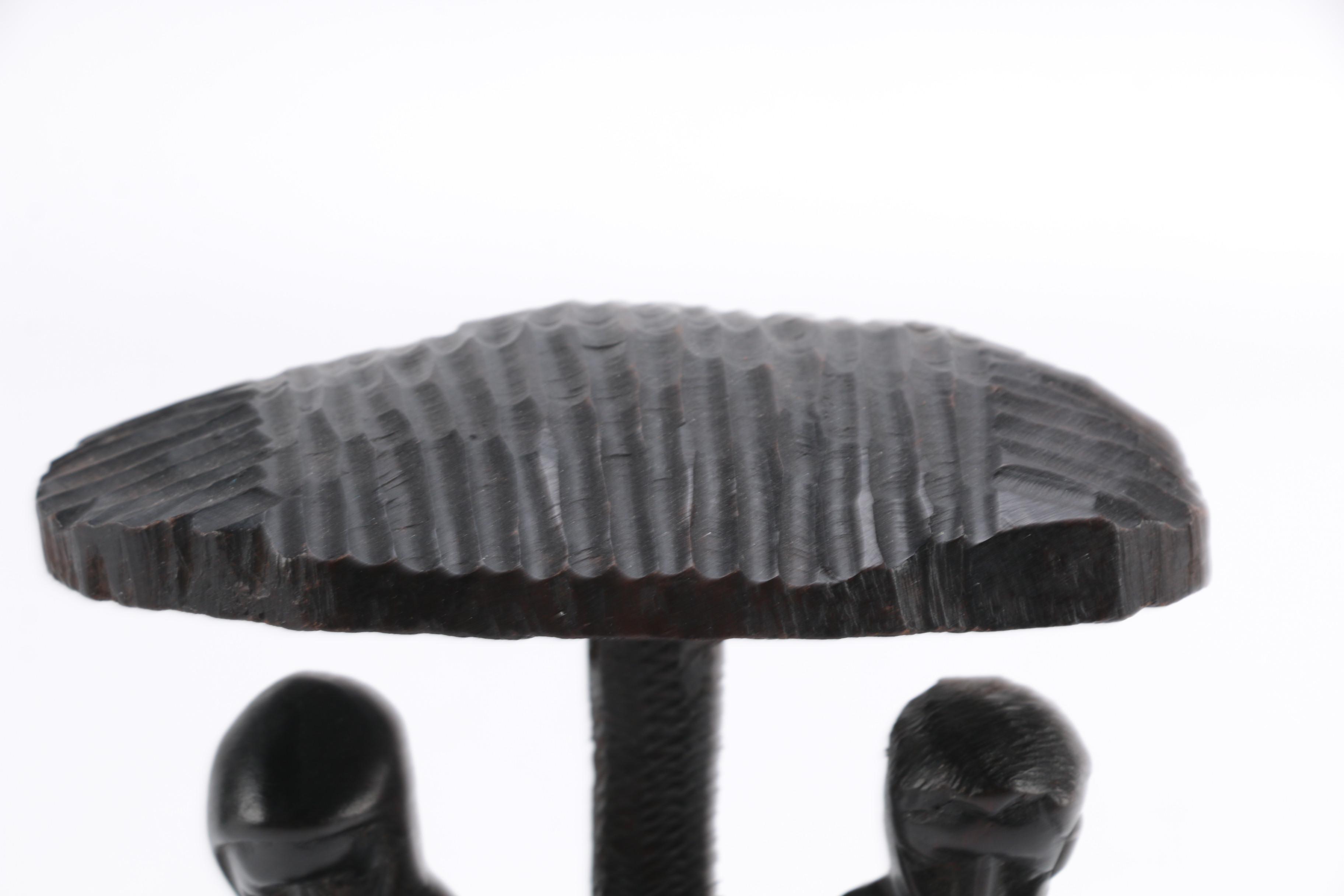 Hand-Carved Figural Sculpture