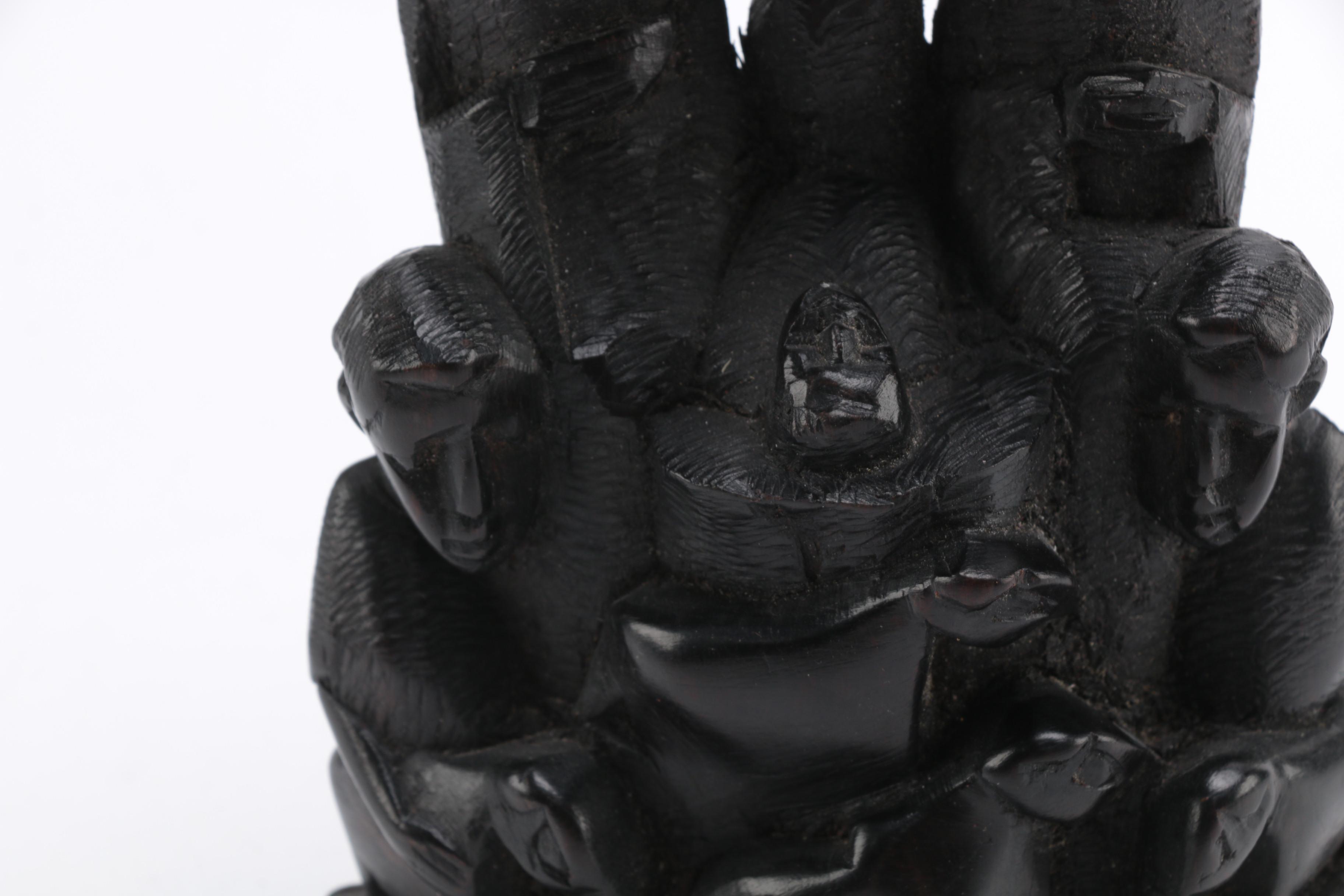 Hand-Carved Figural Sculpture