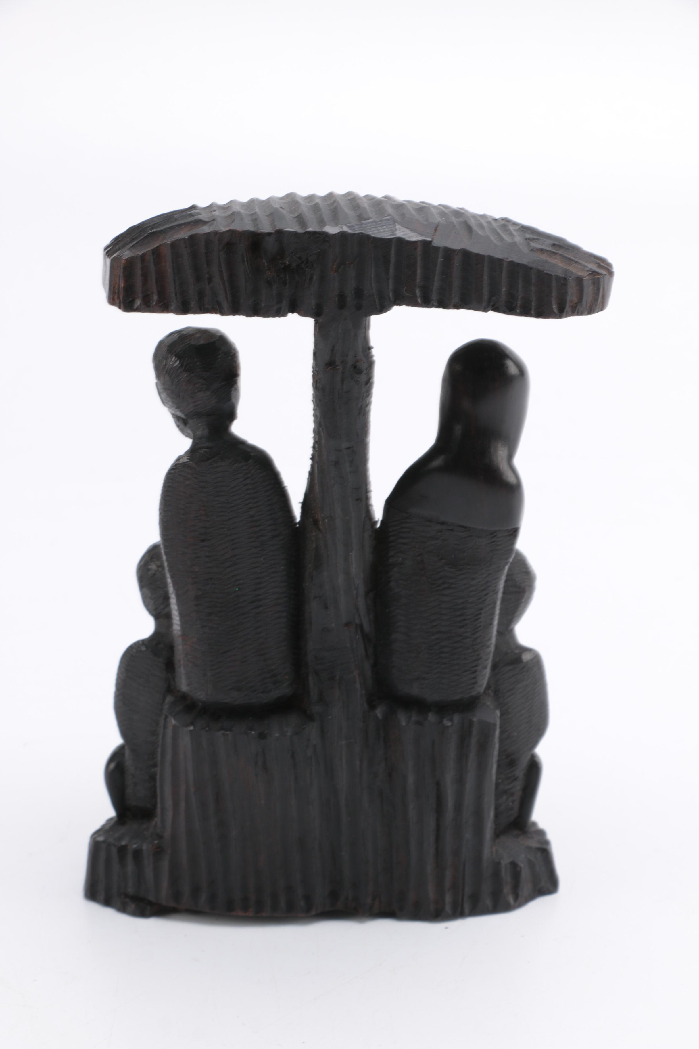 Hand-Carved Figural Sculpture