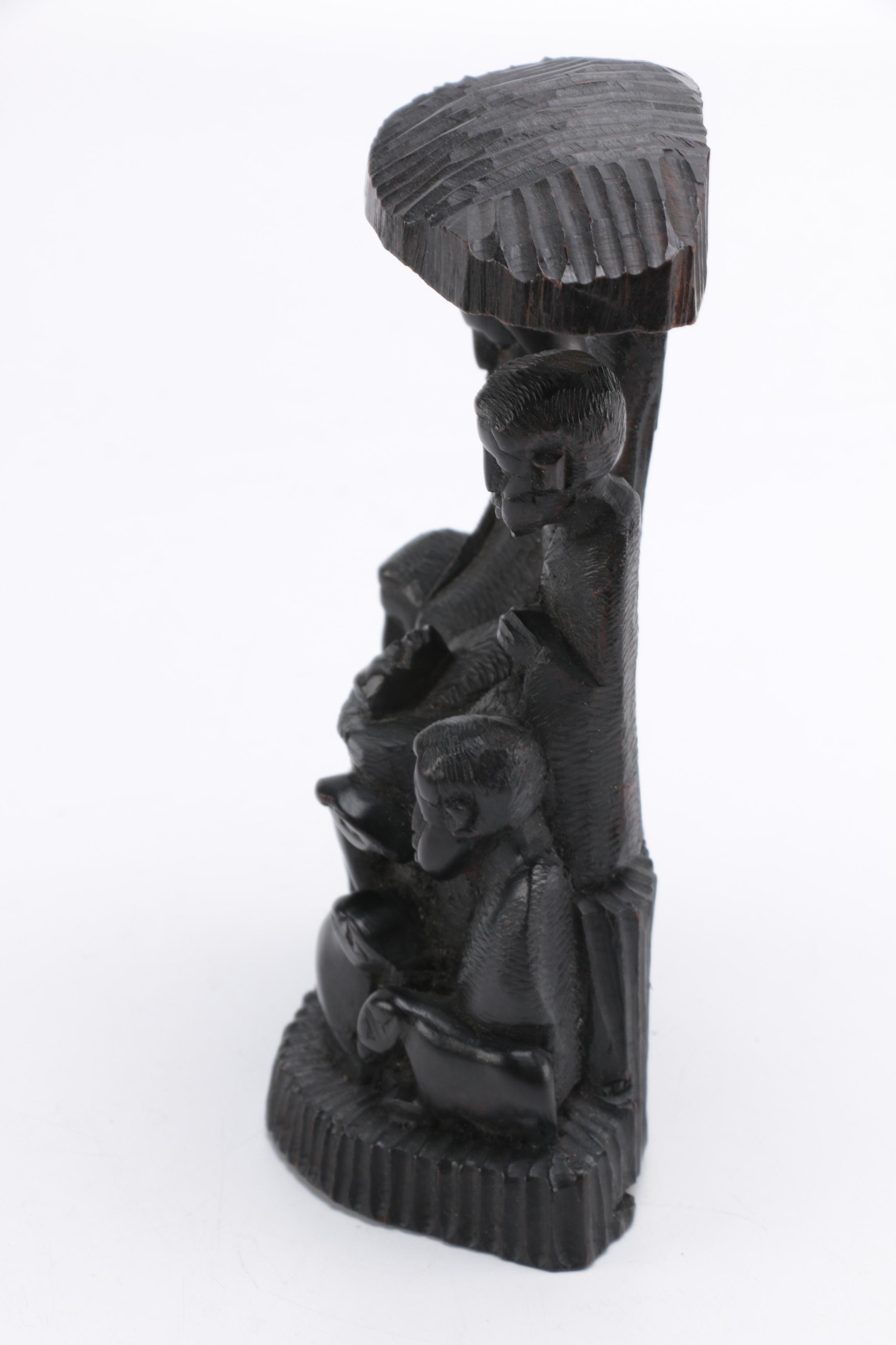 Hand-Carved Figural Sculpture