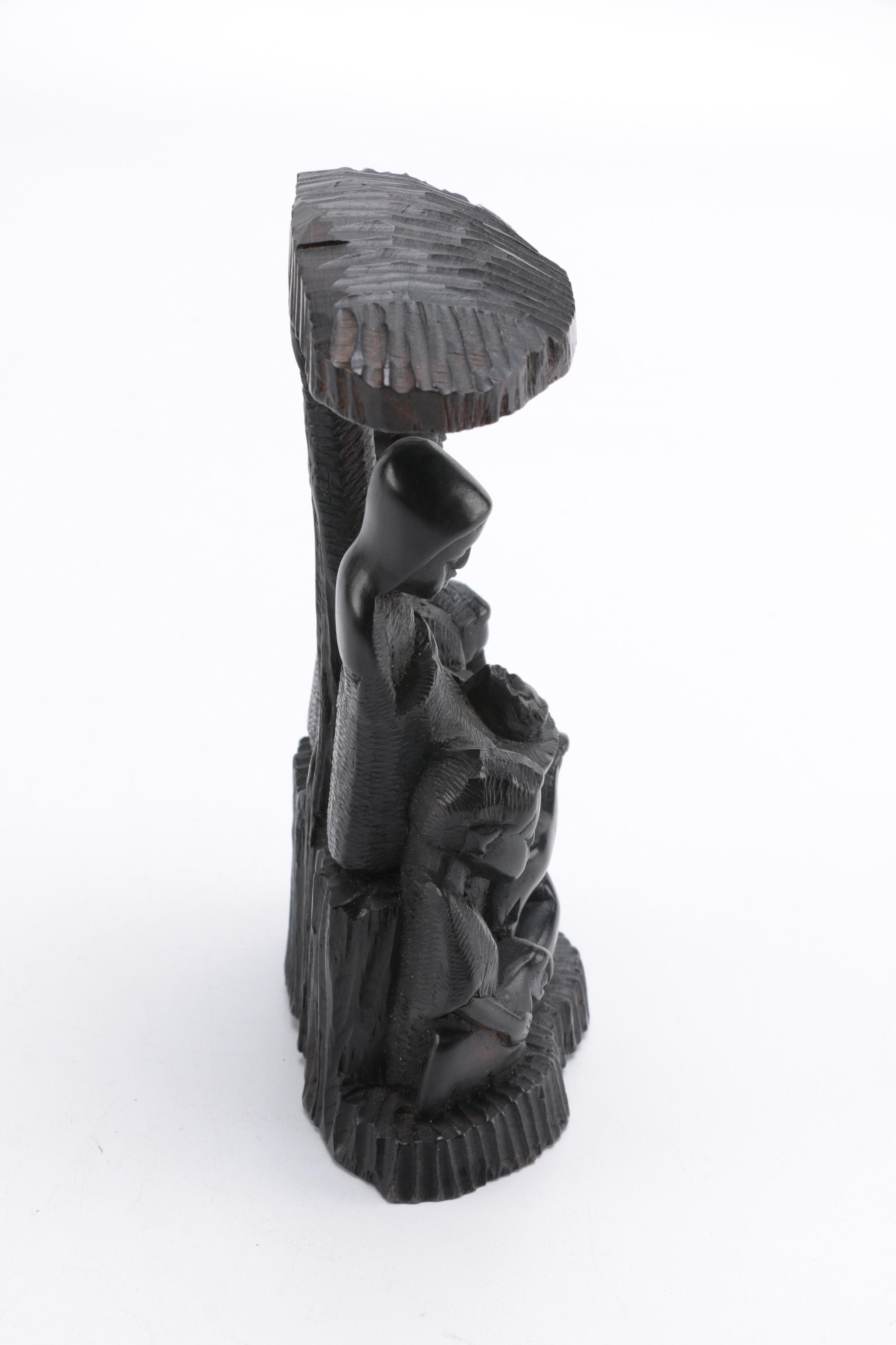 Hand-Carved Figural Sculpture