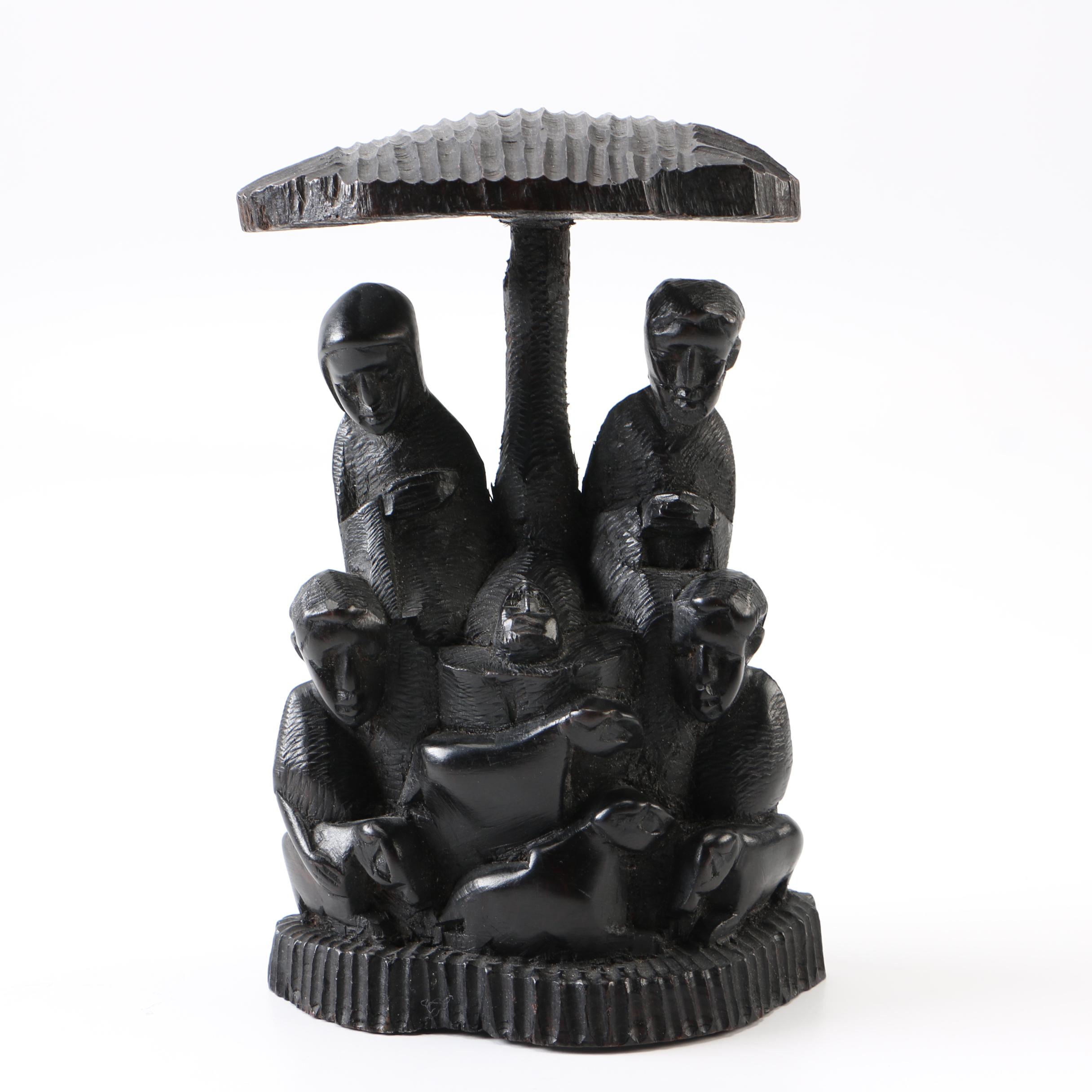 Hand-Carved Figural Sculpture