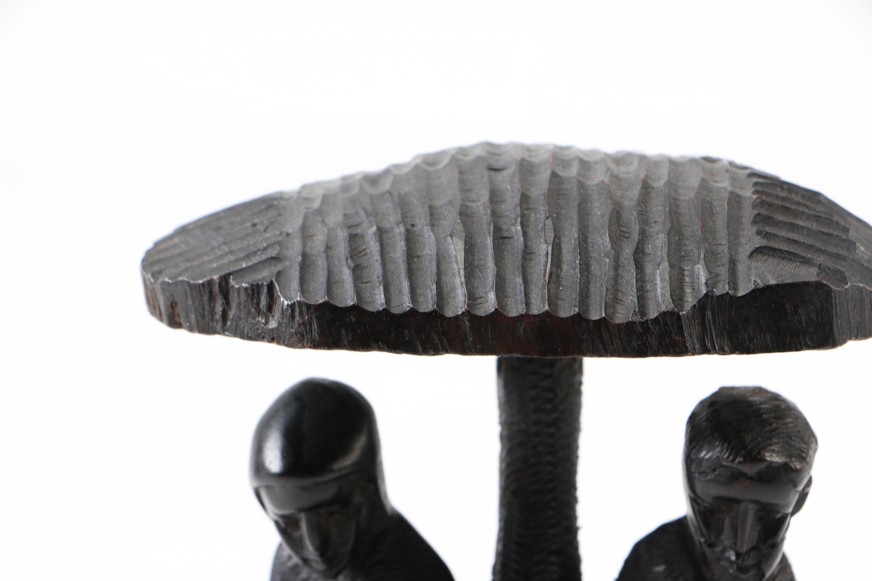 Hand-Carved Figural Sculpture