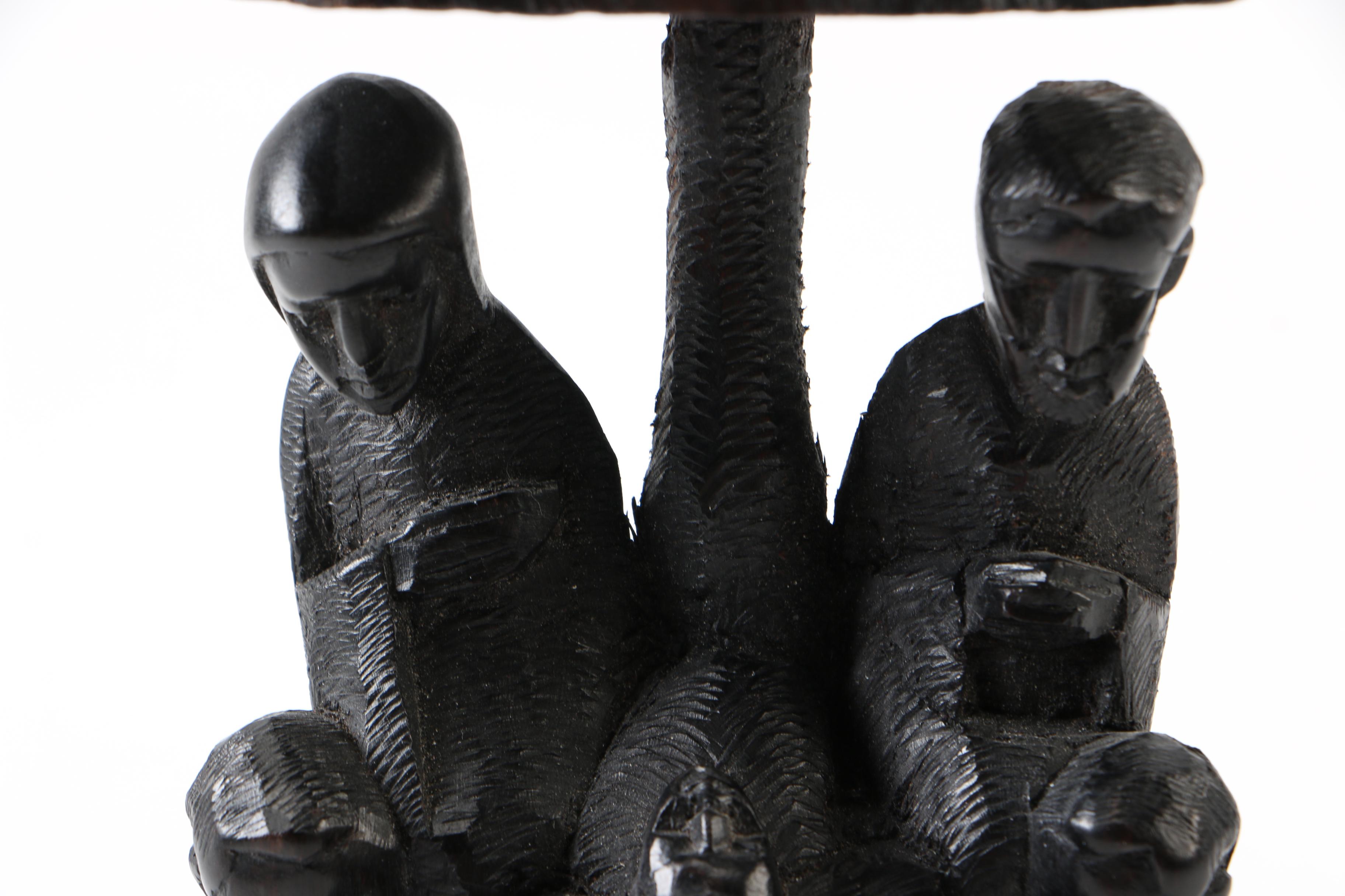 Hand-Carved Figural Sculpture