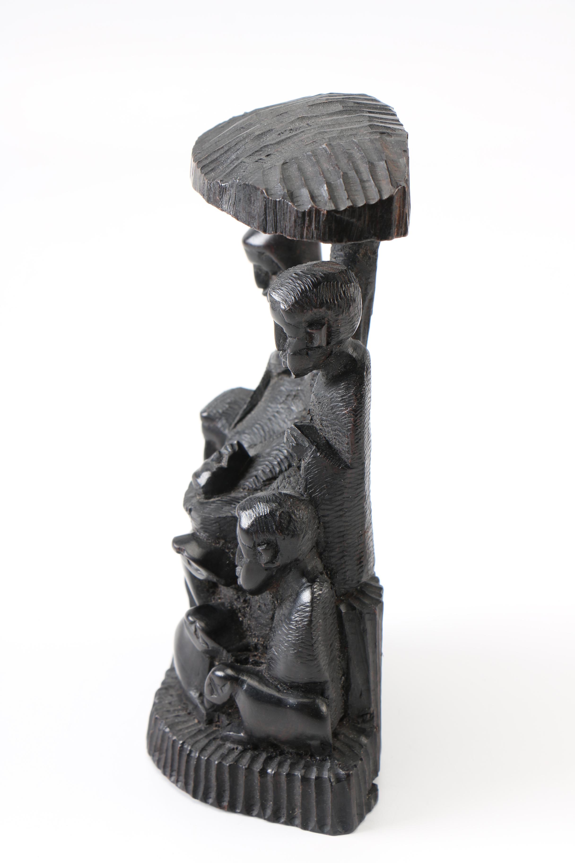 Hand-Carved Figural Sculpture