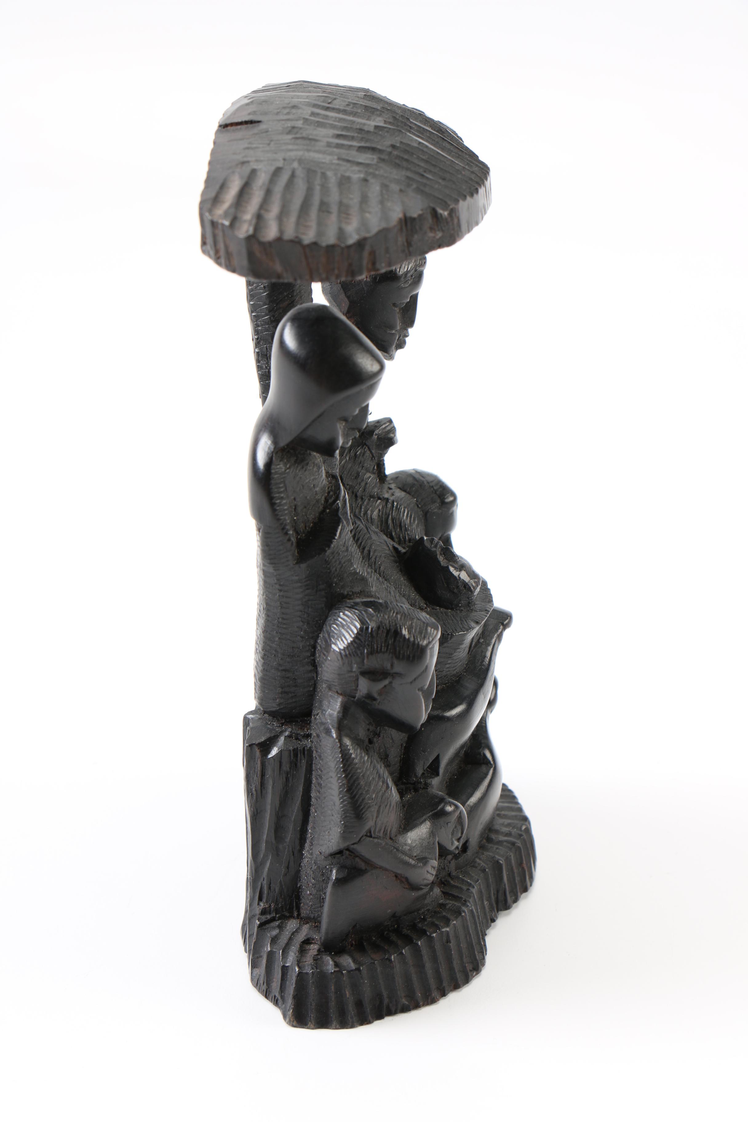 Hand-Carved Figural Sculpture