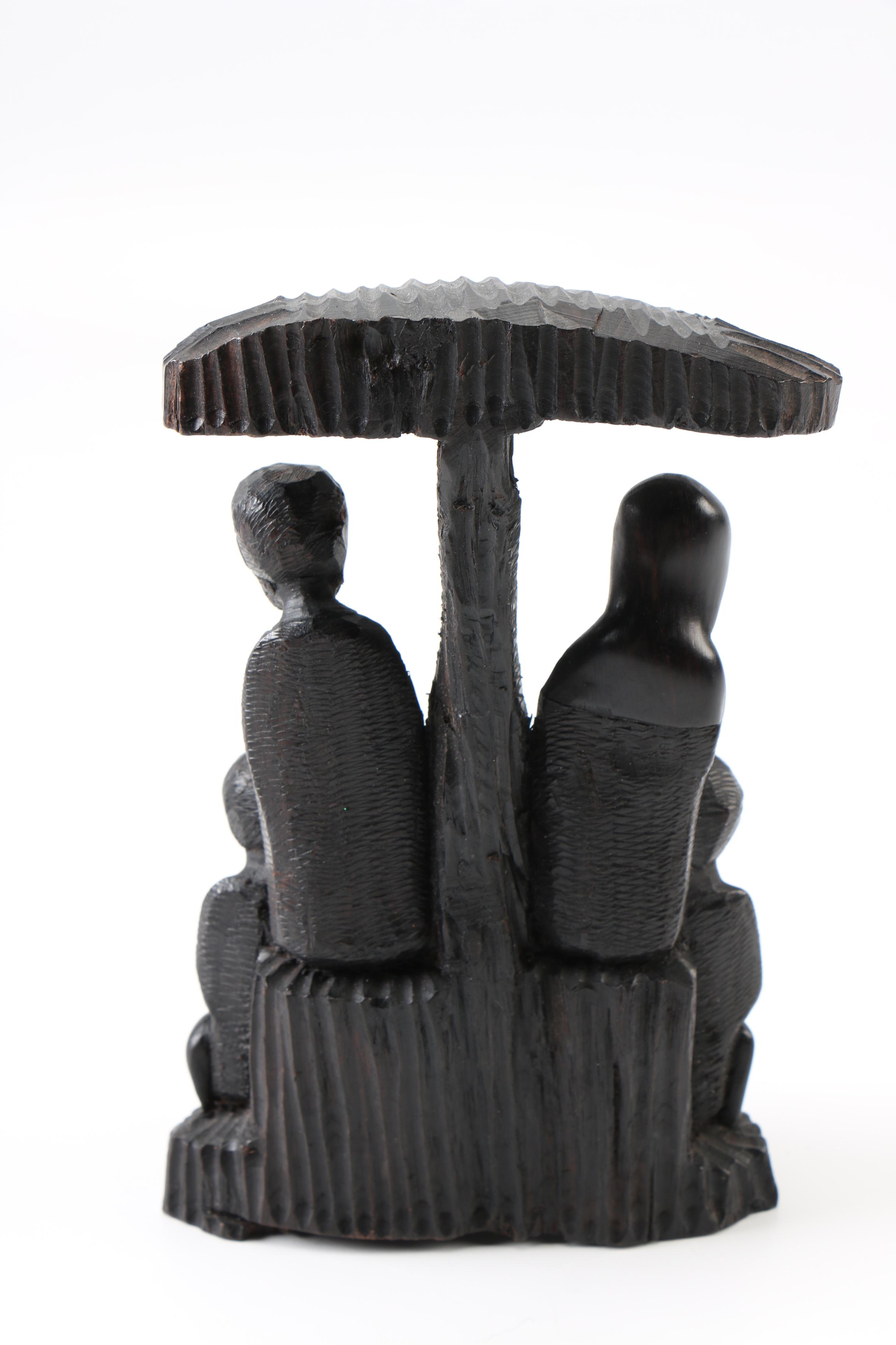 Hand-Carved Figural Sculpture