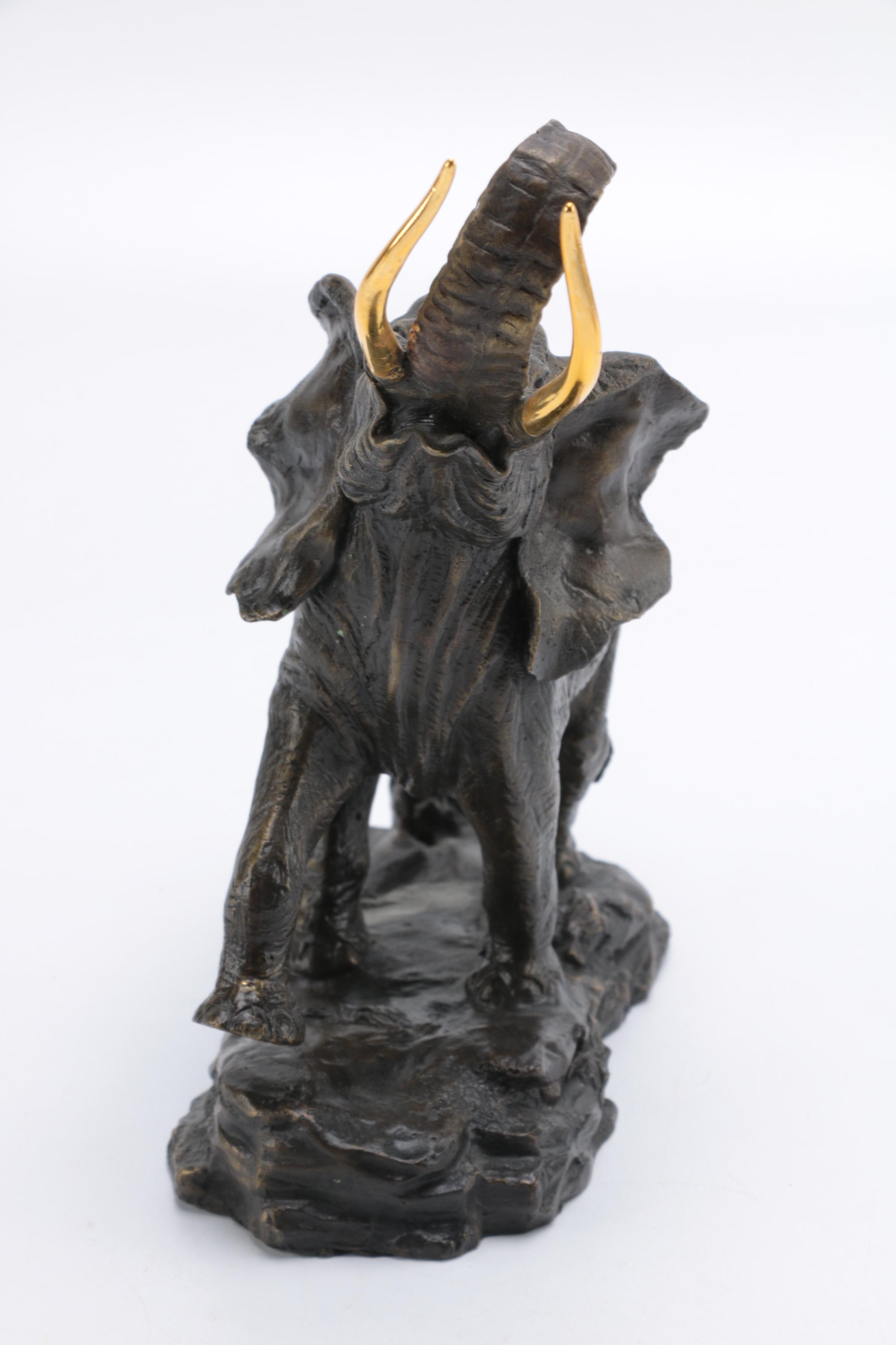 Elephant Figurines Including "Giant of the Serengeti"