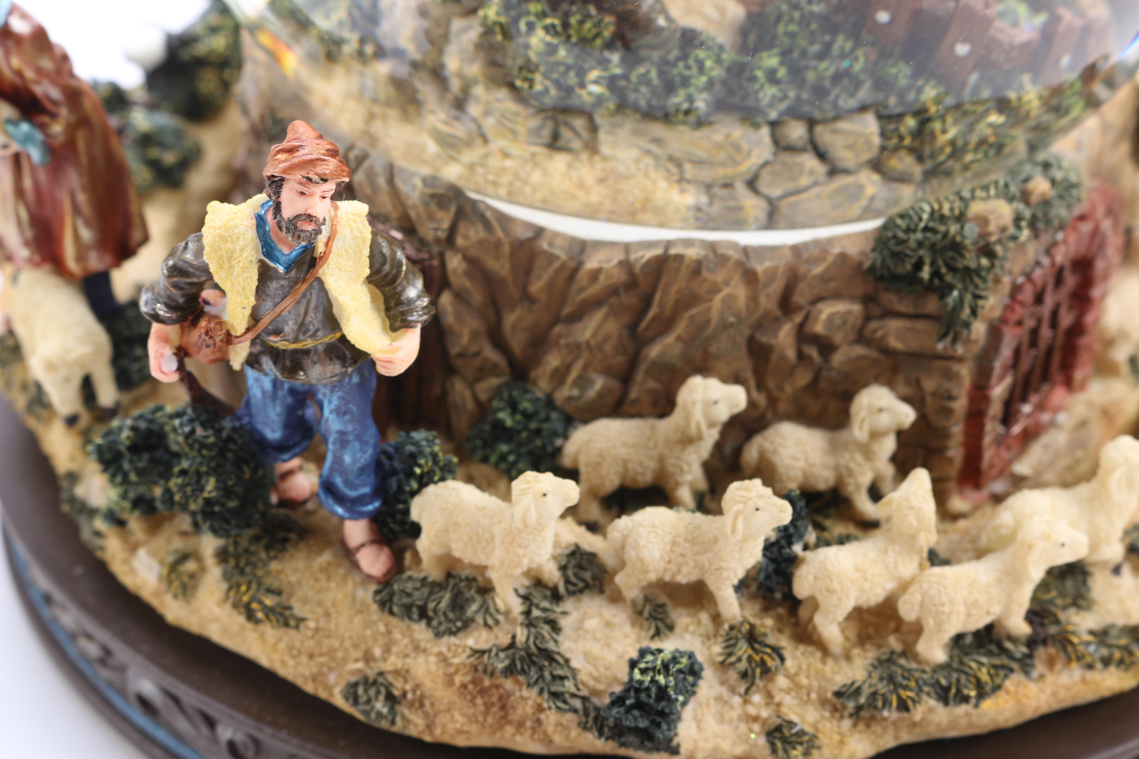 Two Kirkland Signature Musical Water globes