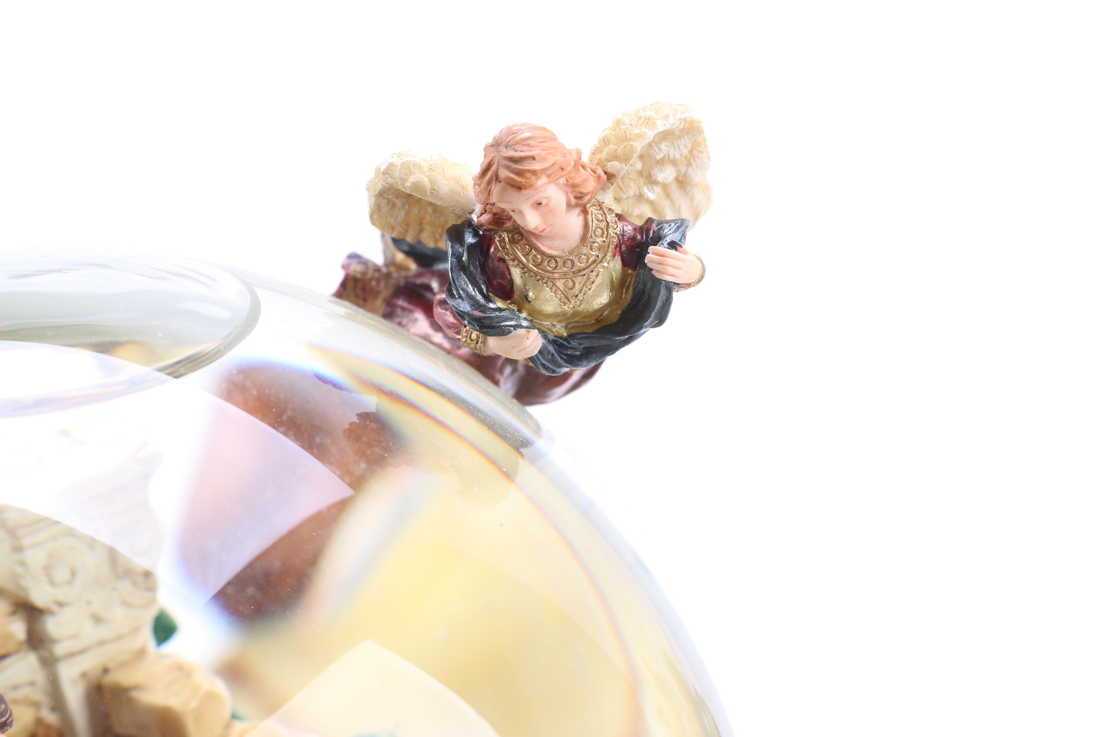 Two Kirkland Signature Musical Water globes