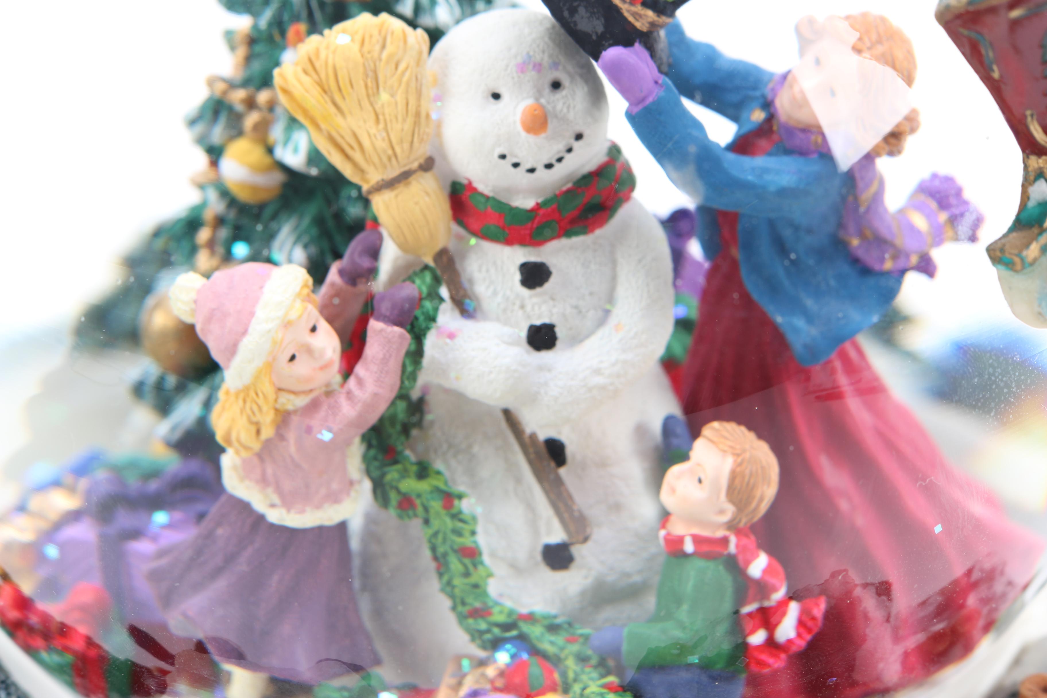 Two Kirkland Signature Musical Water globes