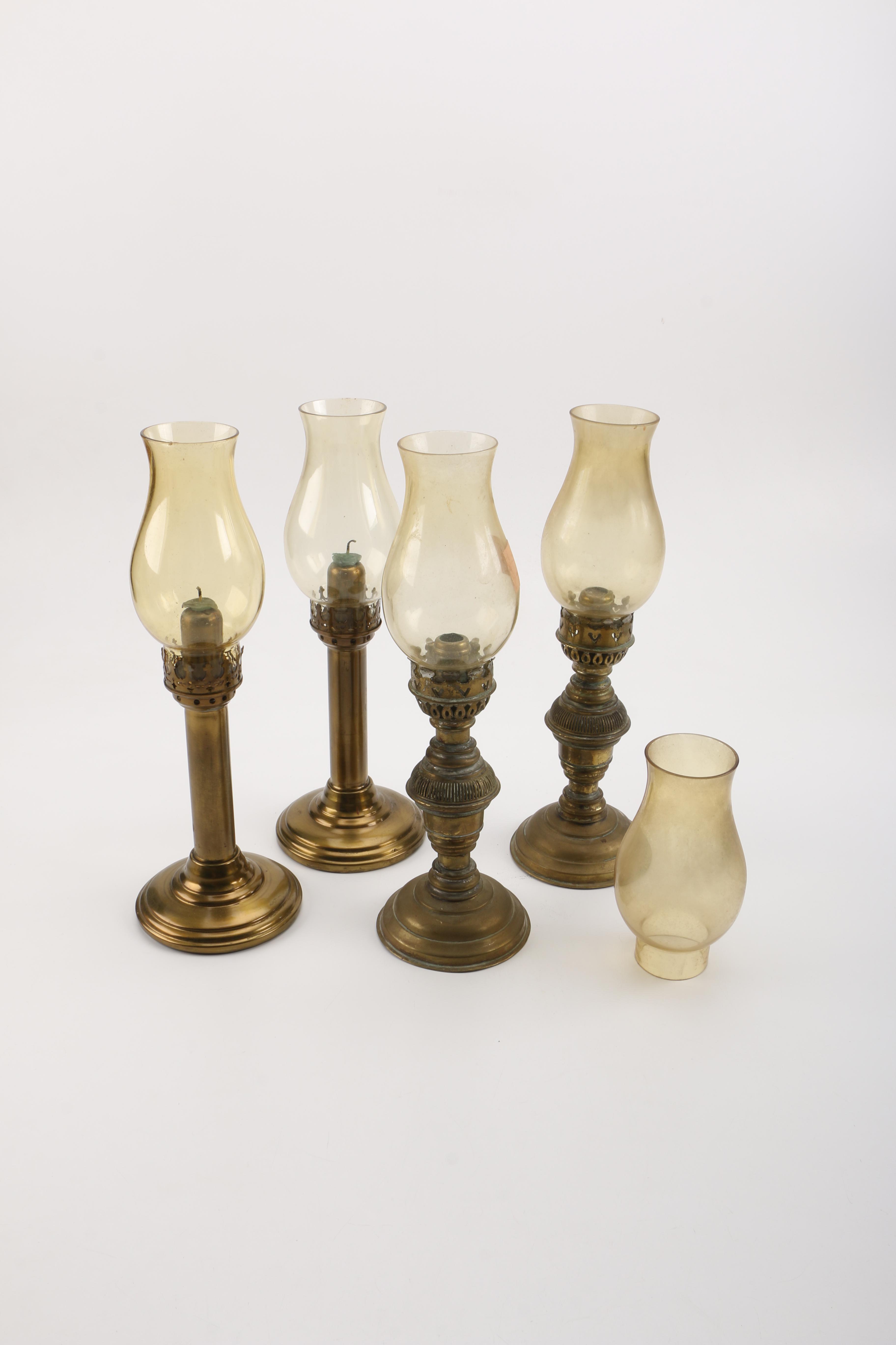 Collection of Brass Oil Lamps Candle Holders