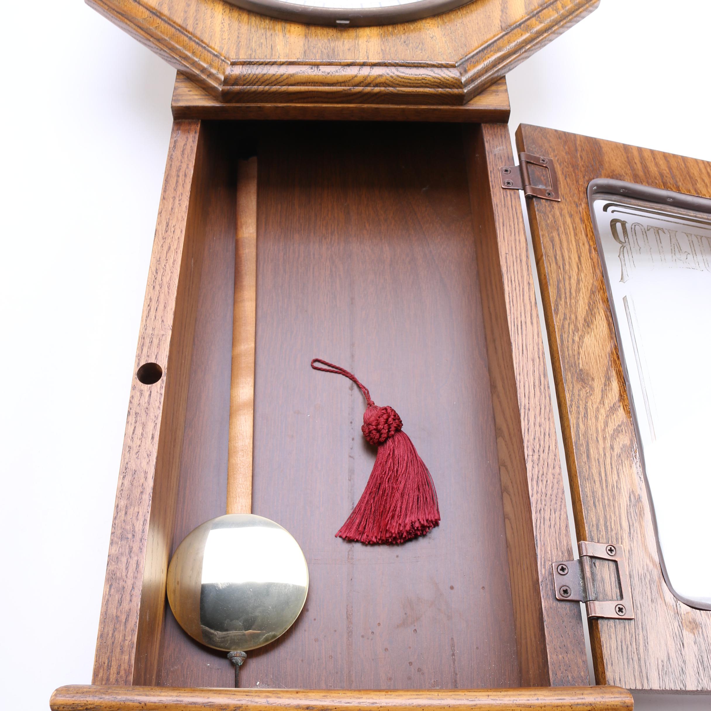 Howard Miller Wood Pendulum Wall Clock