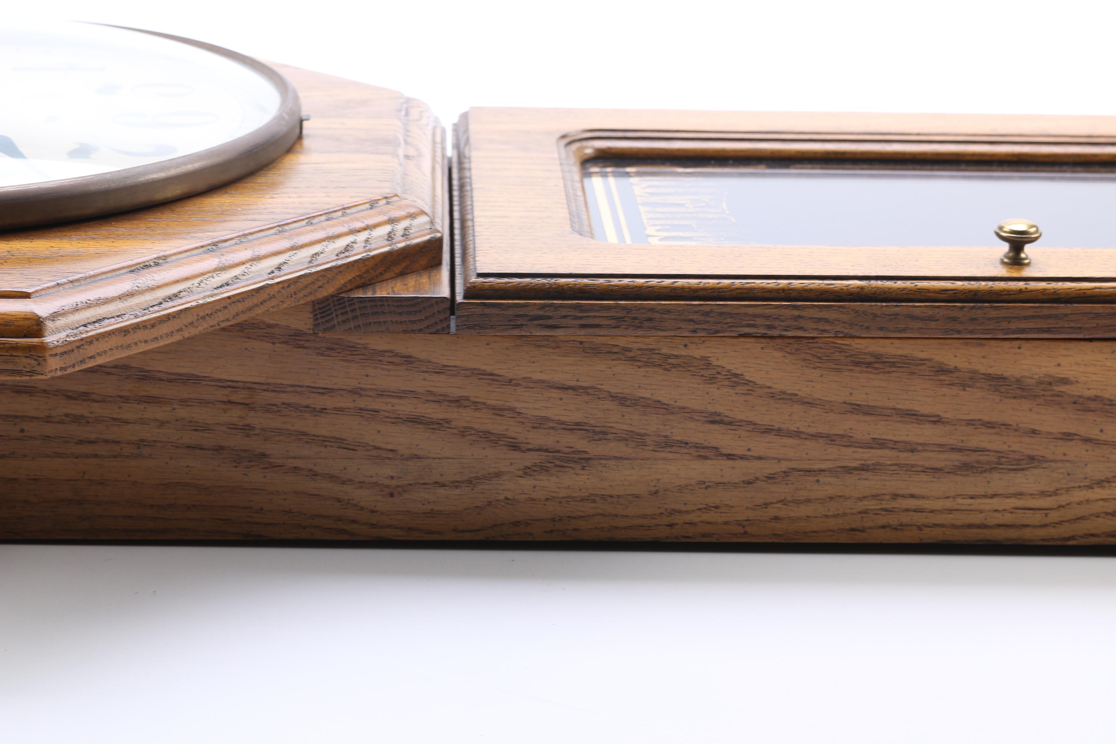 Howard Miller Wood Pendulum Wall Clock