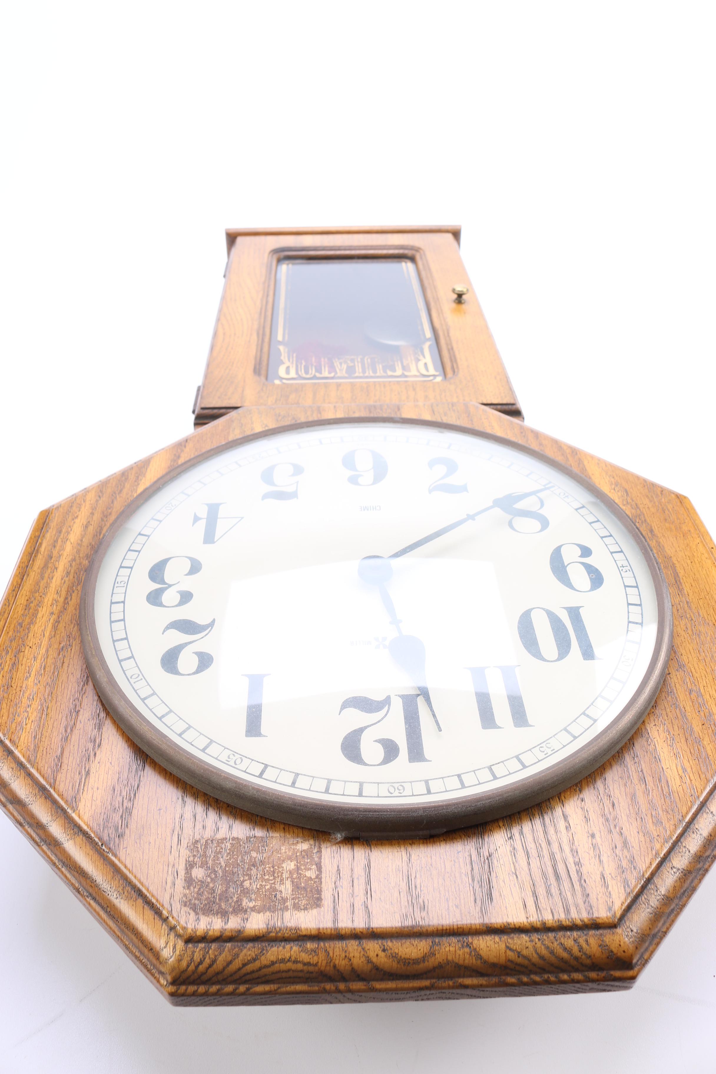 Howard Miller Wood Pendulum Wall Clock