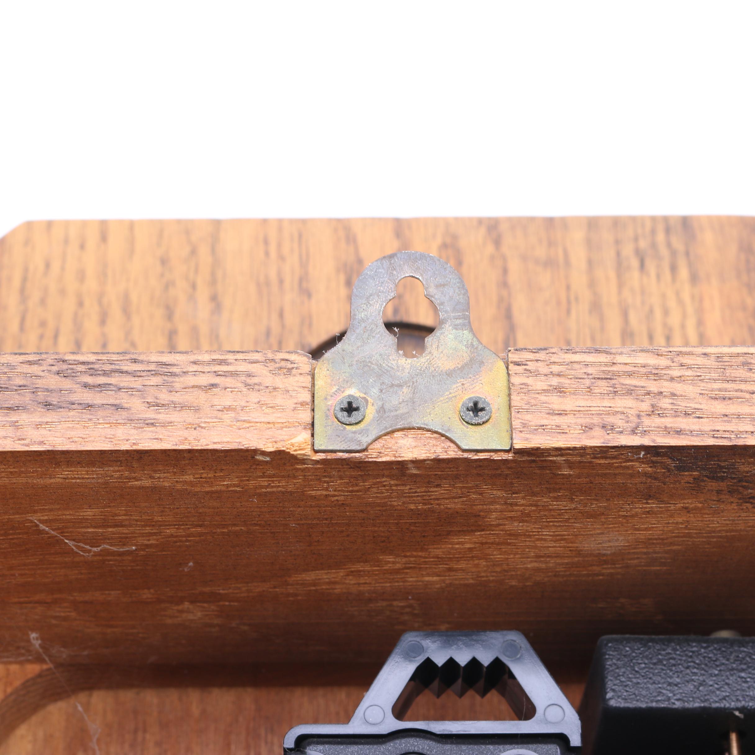 Howard Miller Wood Pendulum Wall Clock