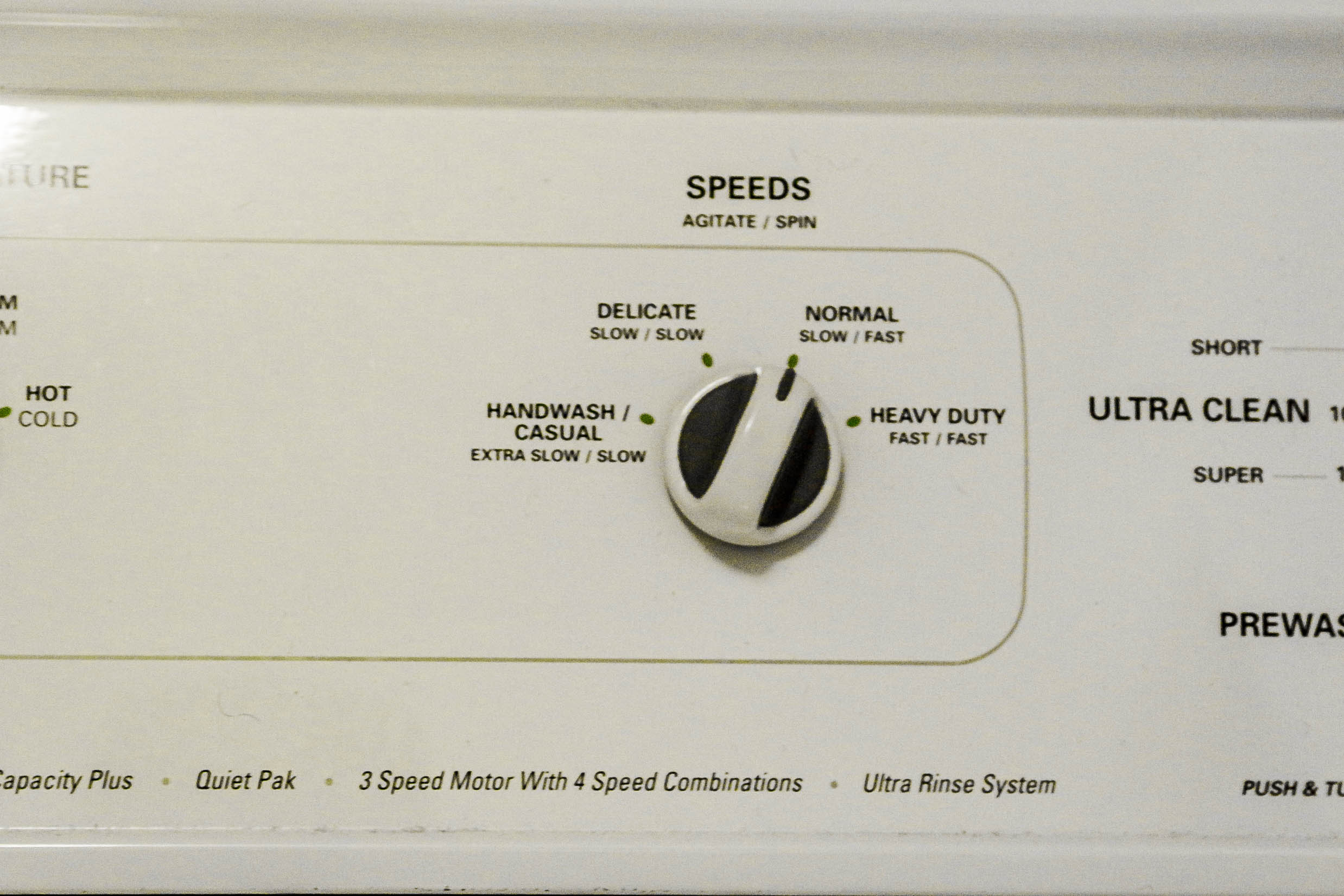 A Kenmore 80 Series Front Load Washer And Top Load Dryer Set