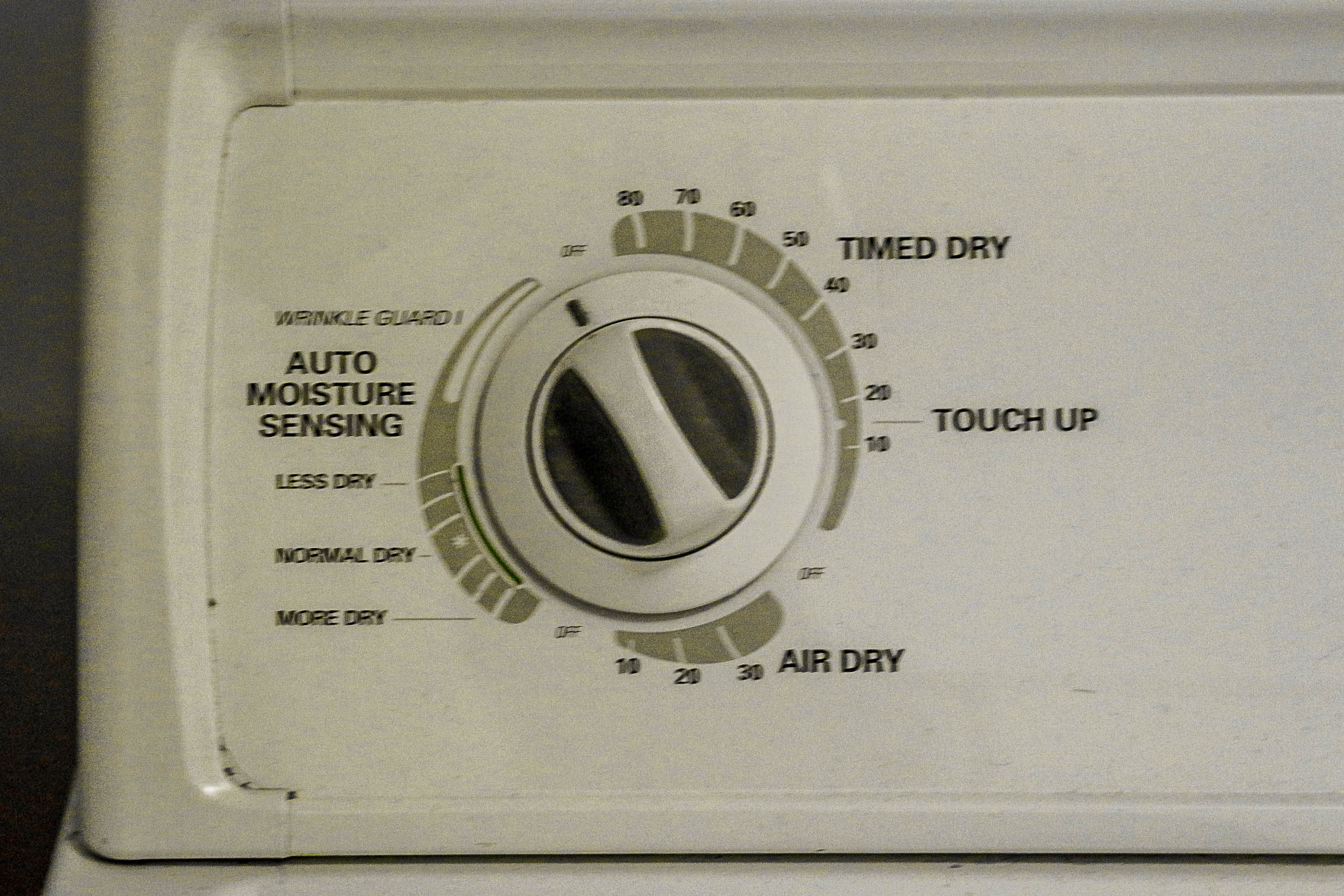 A Kenmore 80 Series Front Load Washer And Top Load Dryer Set