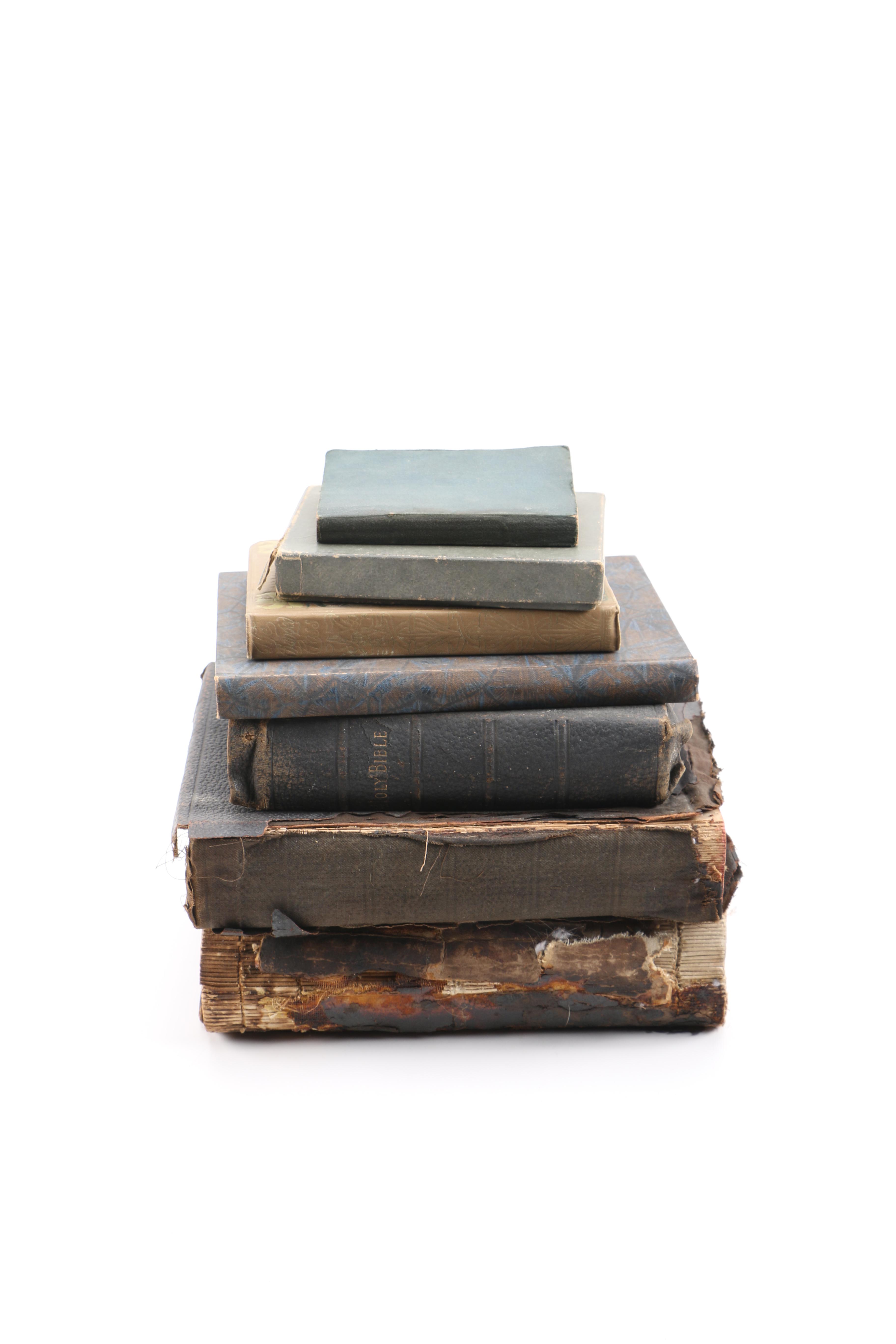 Assortment of Holy Bibles and Religious Poem Books