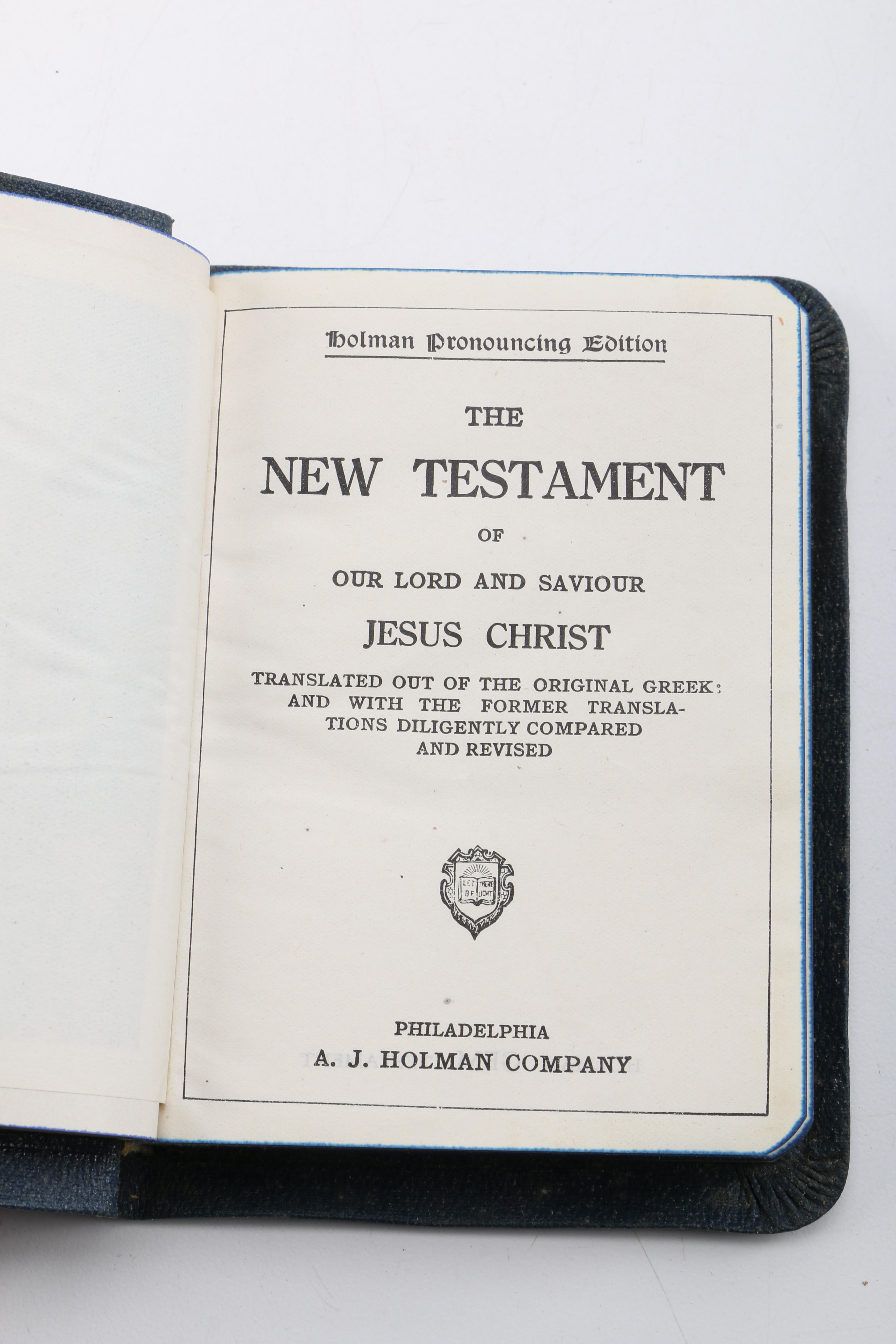 Assortment of Holy Bibles and Religious Poem Books