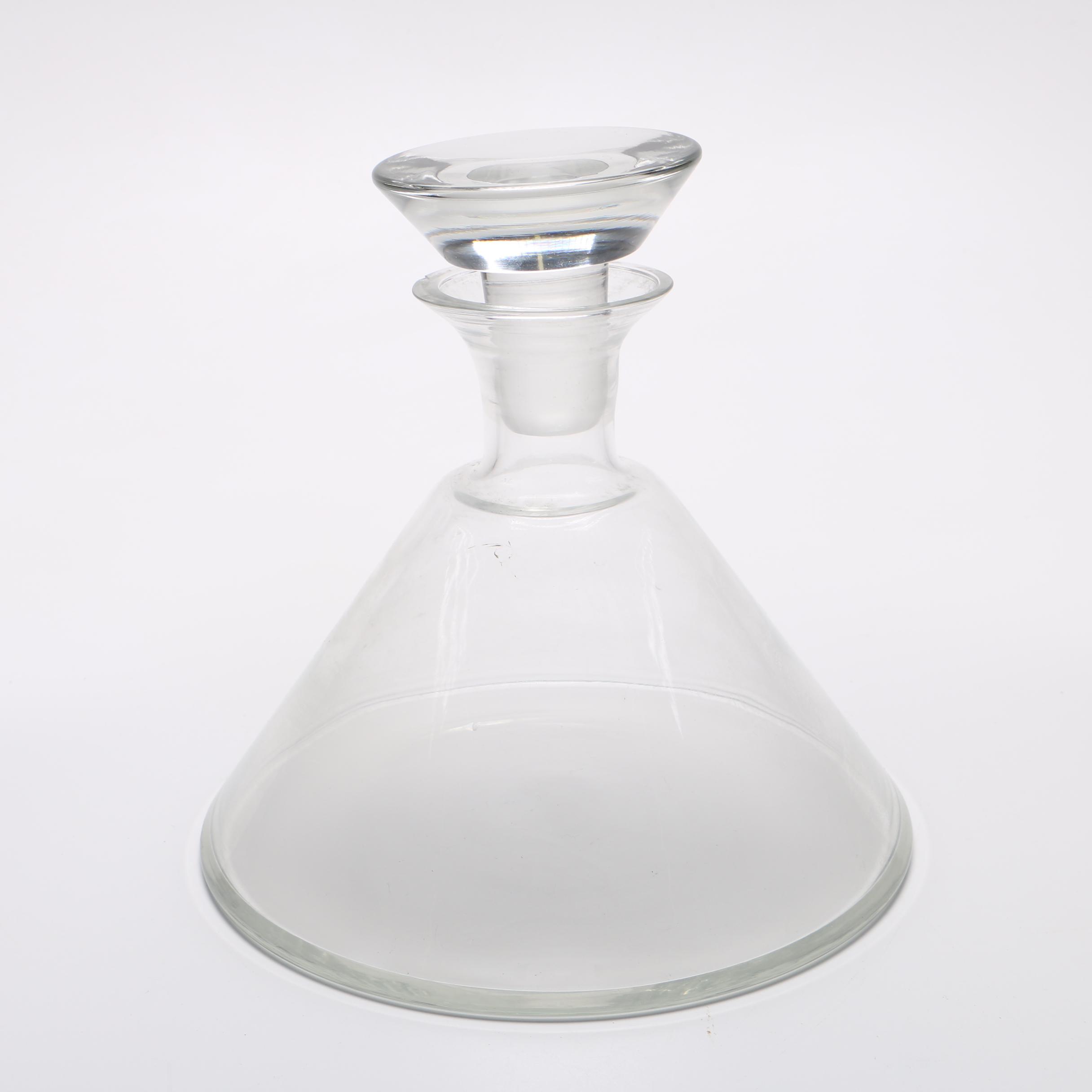 Glass decanter and two beer mugs