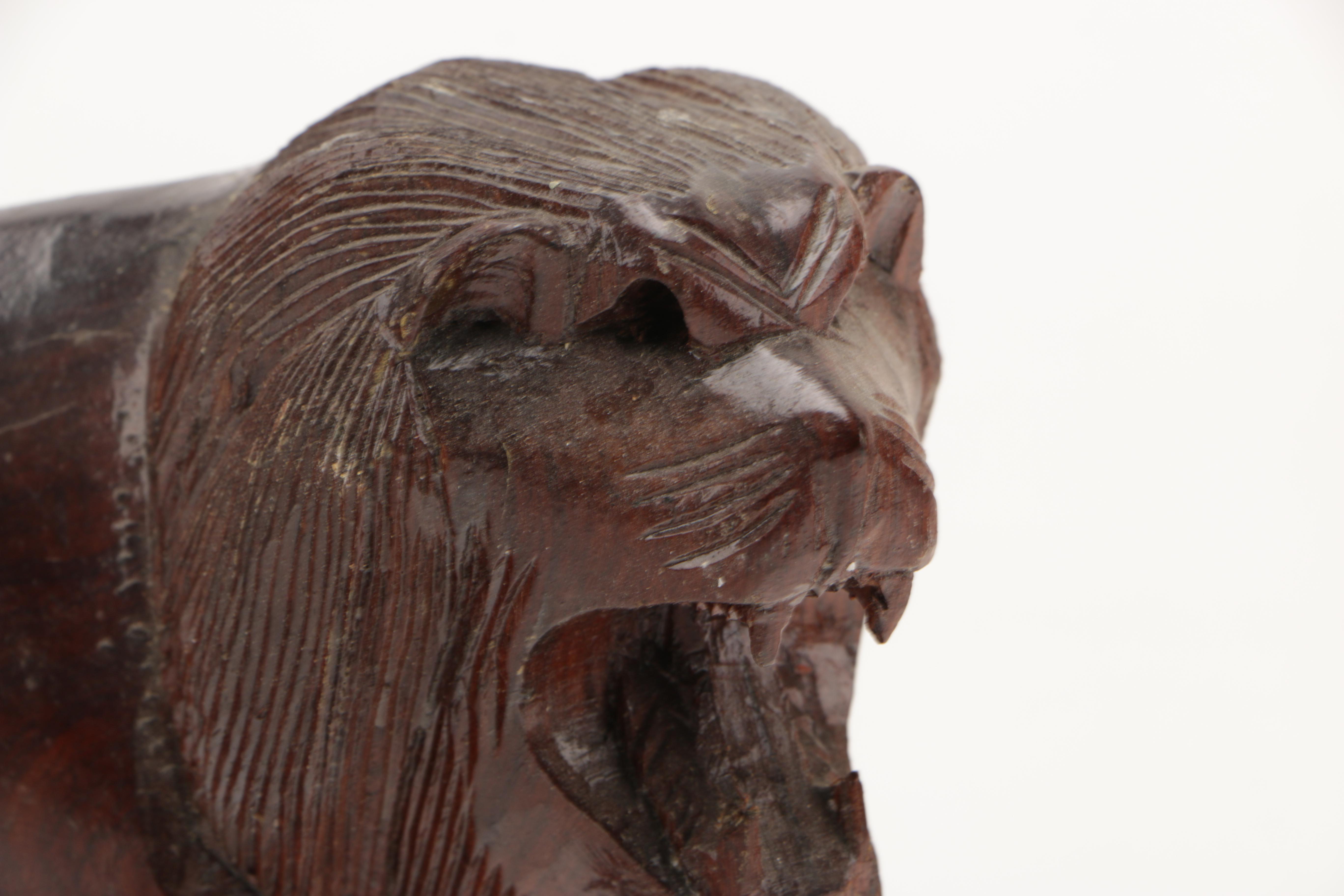 Hand-Carved Lion Figurines
